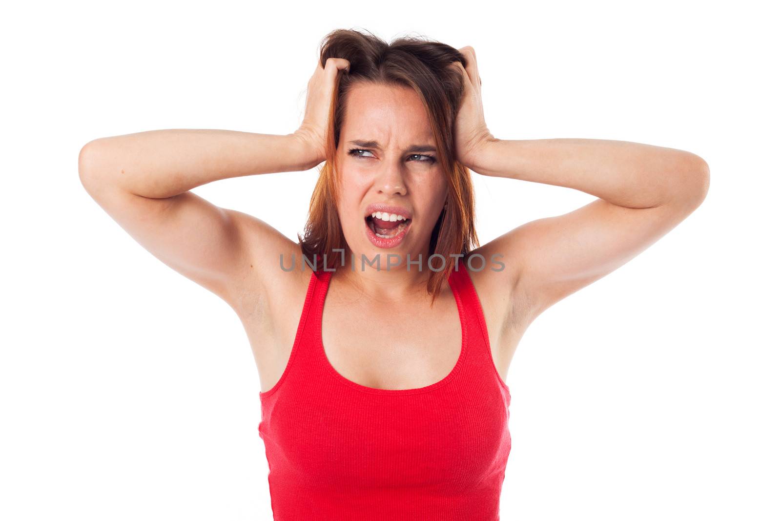 Portrait of a young beautiful woman having a negative expression, isolated on white