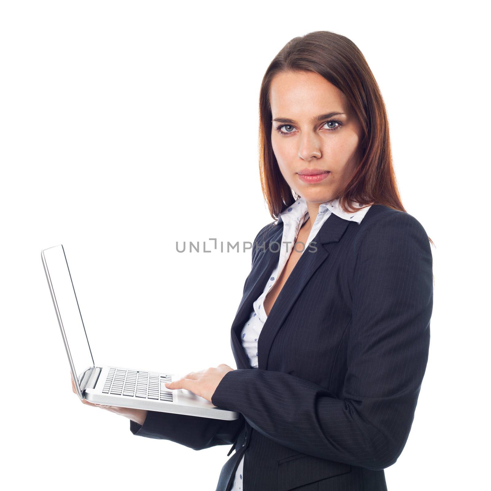 Business woman standing holding her laptop, isolated on white 
