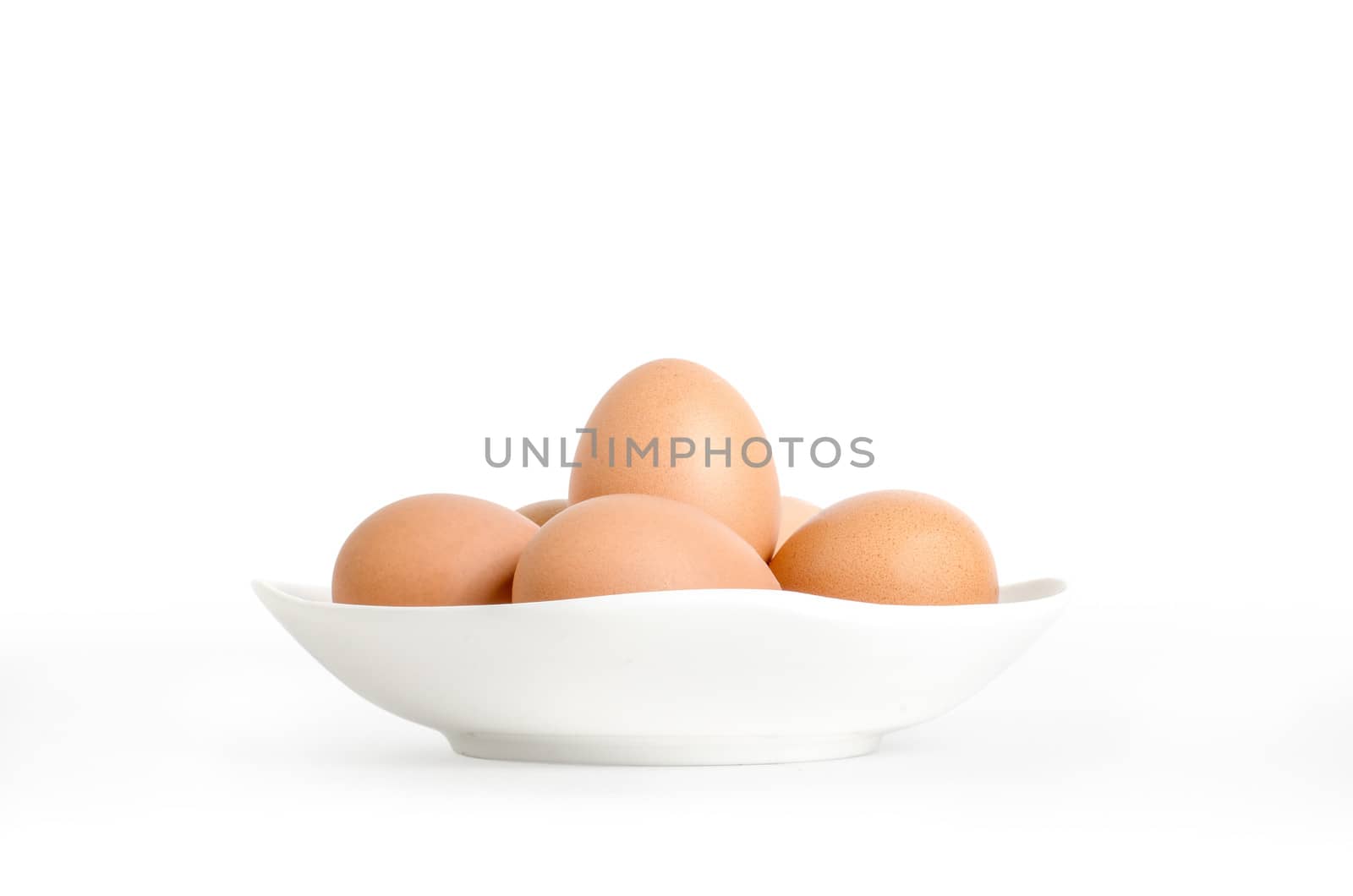 eggs in white dish on white background with clipping path