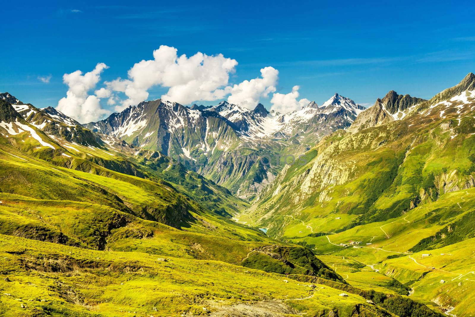 Landscape with a valley, mountain range and hiking trail