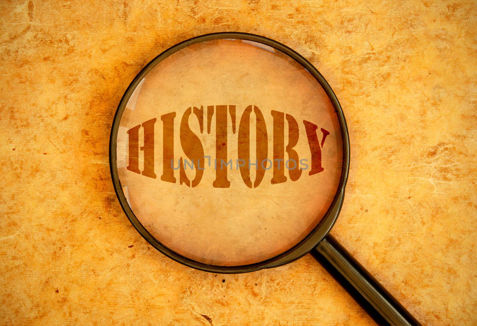 Magnifying glass focused on the word history