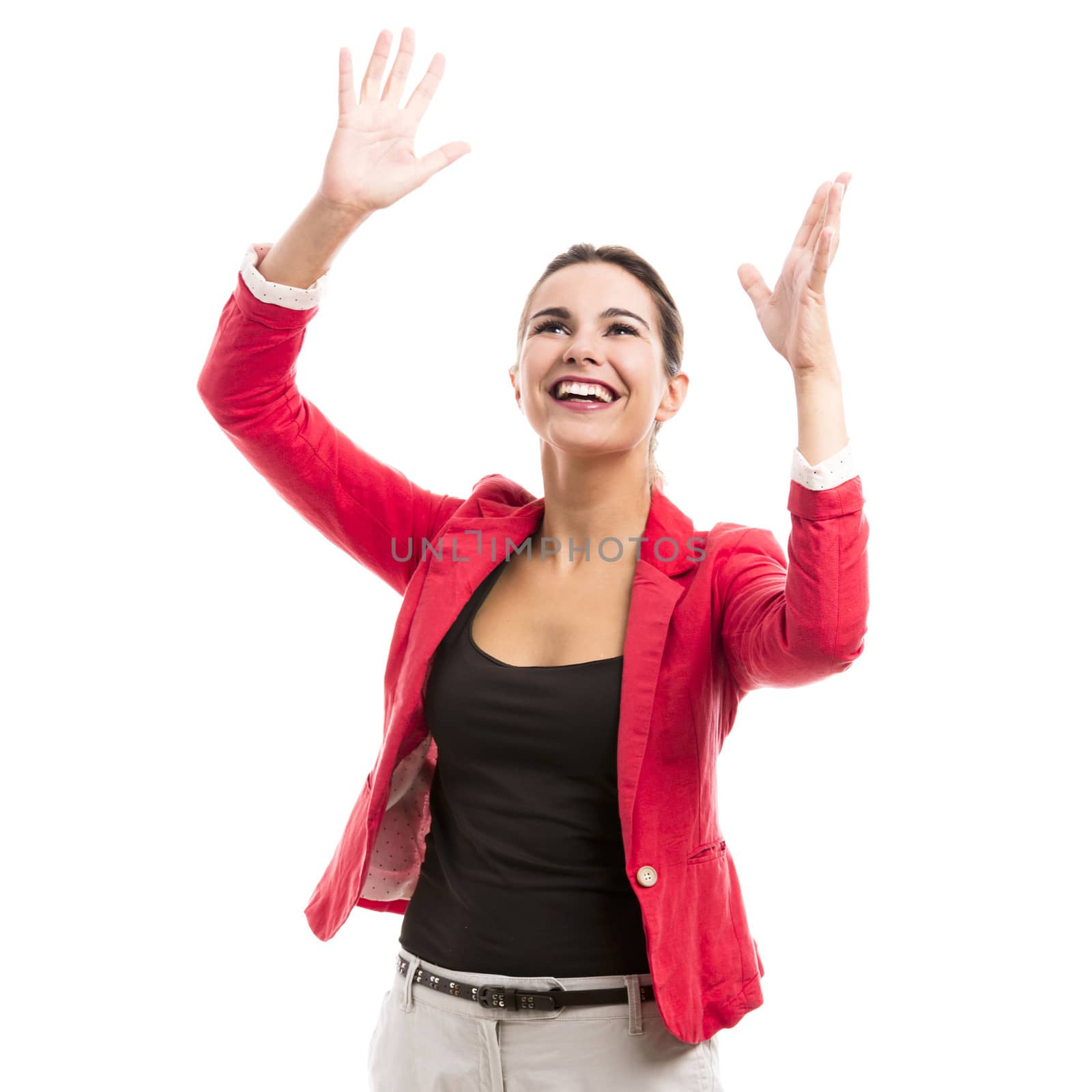 Happy business woman with arms on the air, isolated over a white background