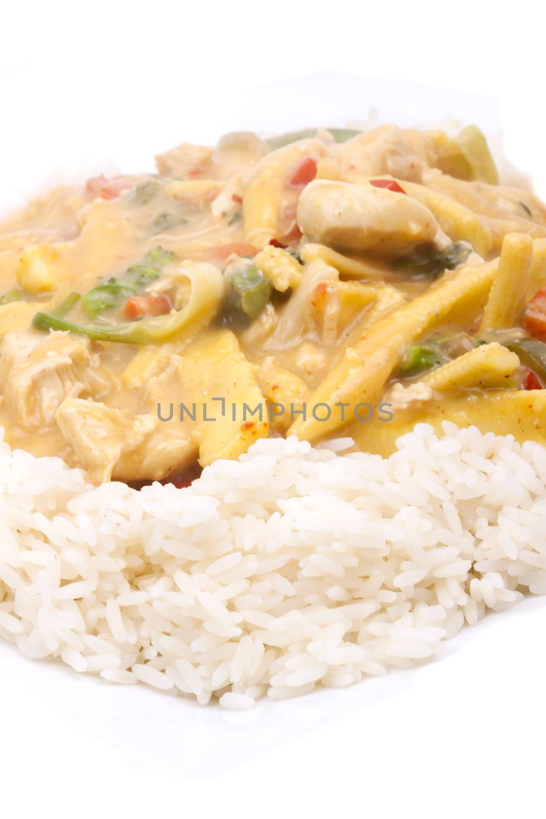 diced chicken in coconut curry sauce served with rice