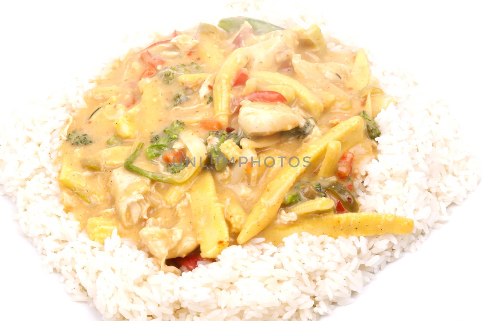 diced chicken in coconut curry sauce served with rice