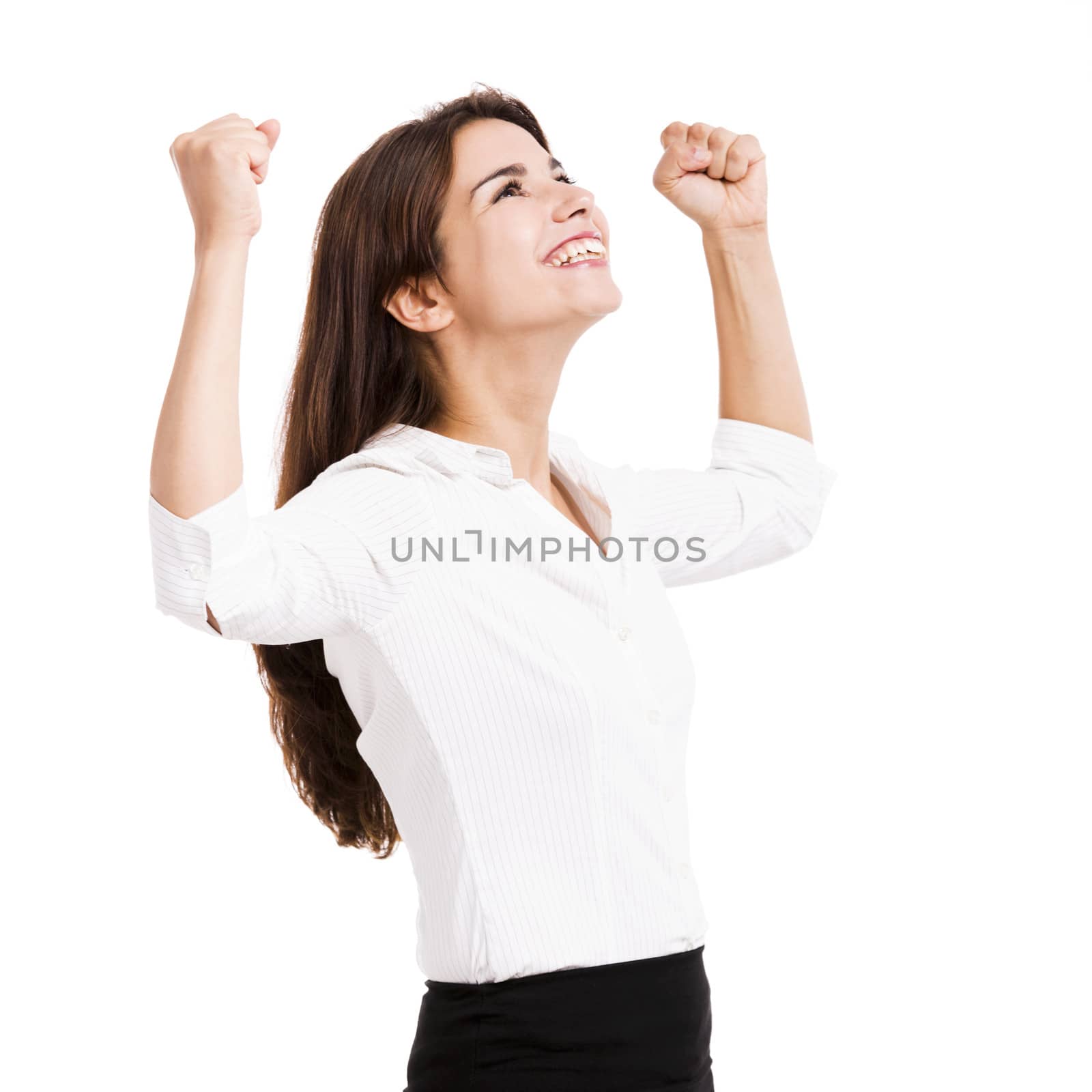 Beautiful and happy hispanic business woman with arms up, isolated over a white background