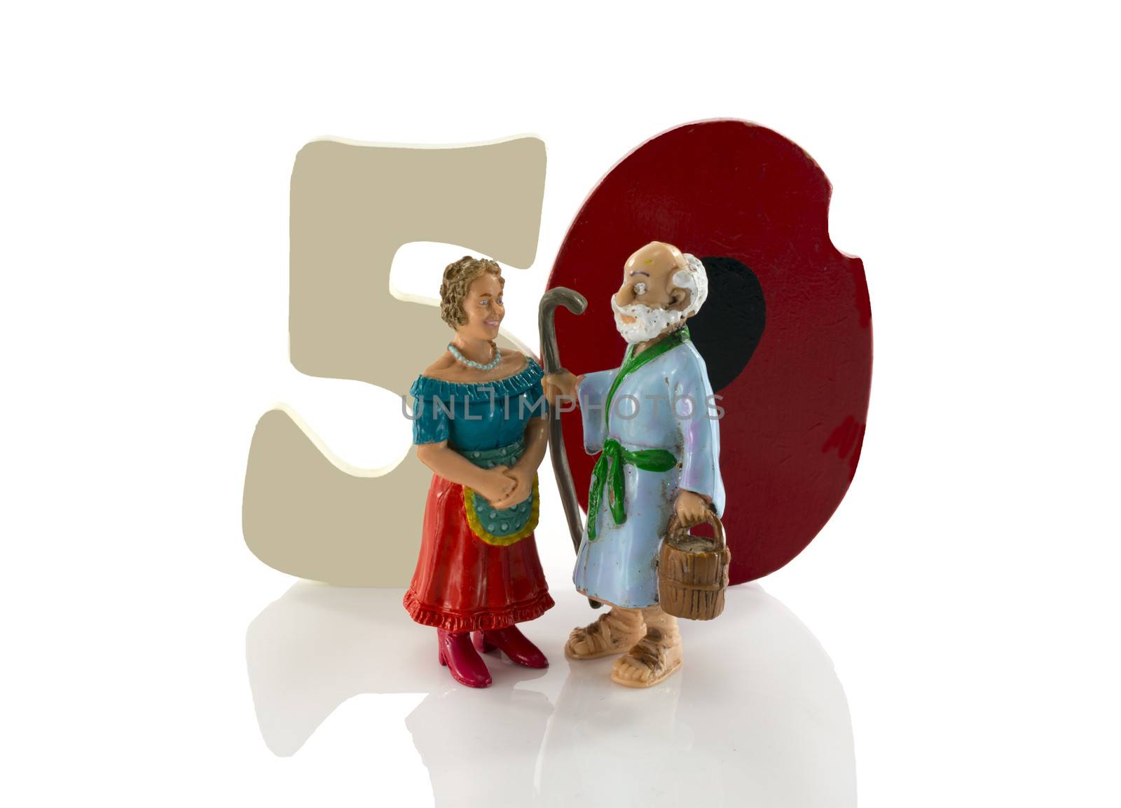 happy older couple with fifty in numbers