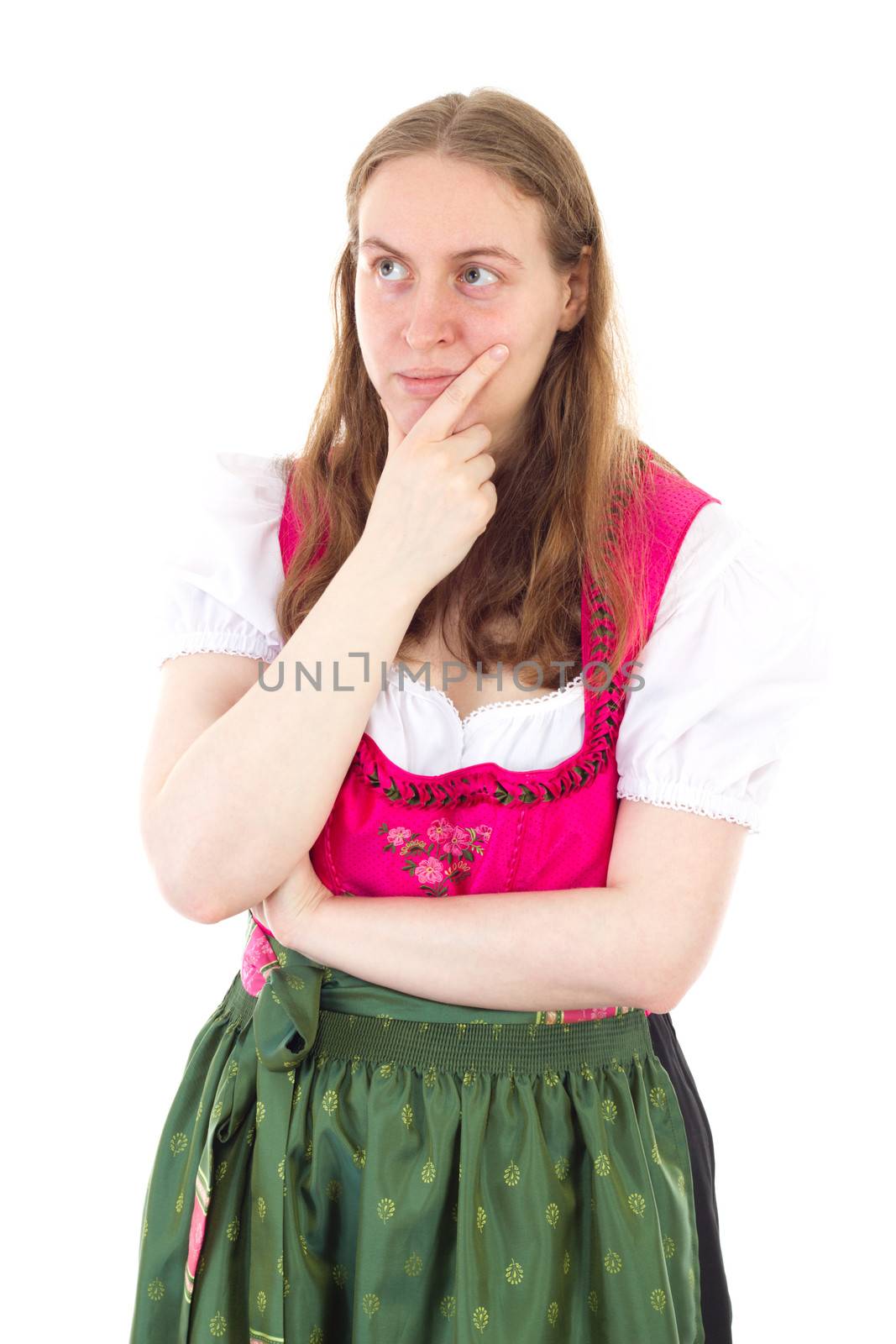 Beautiful girl in dirndl giving thought to her future