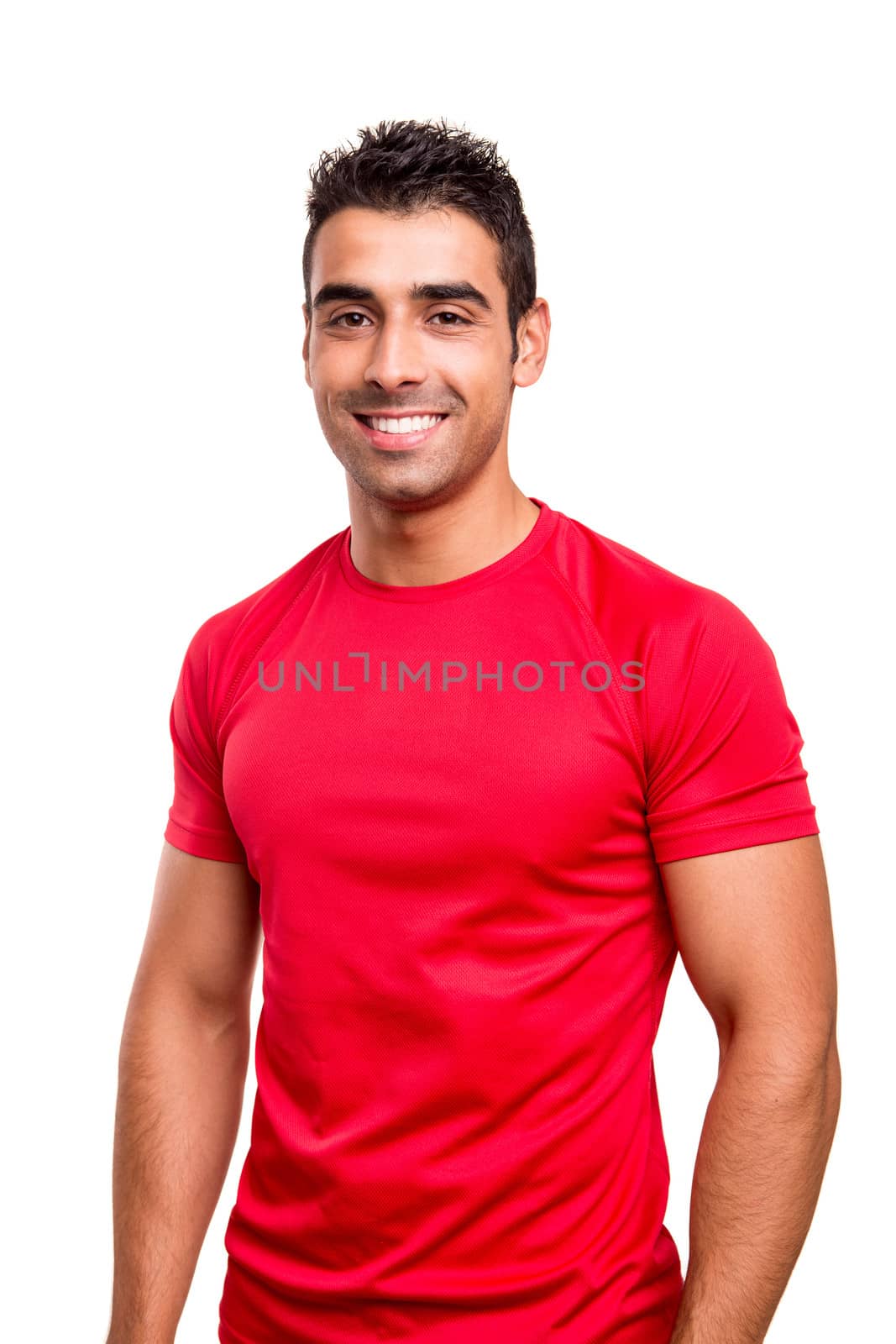 Smiling man posing over white background 