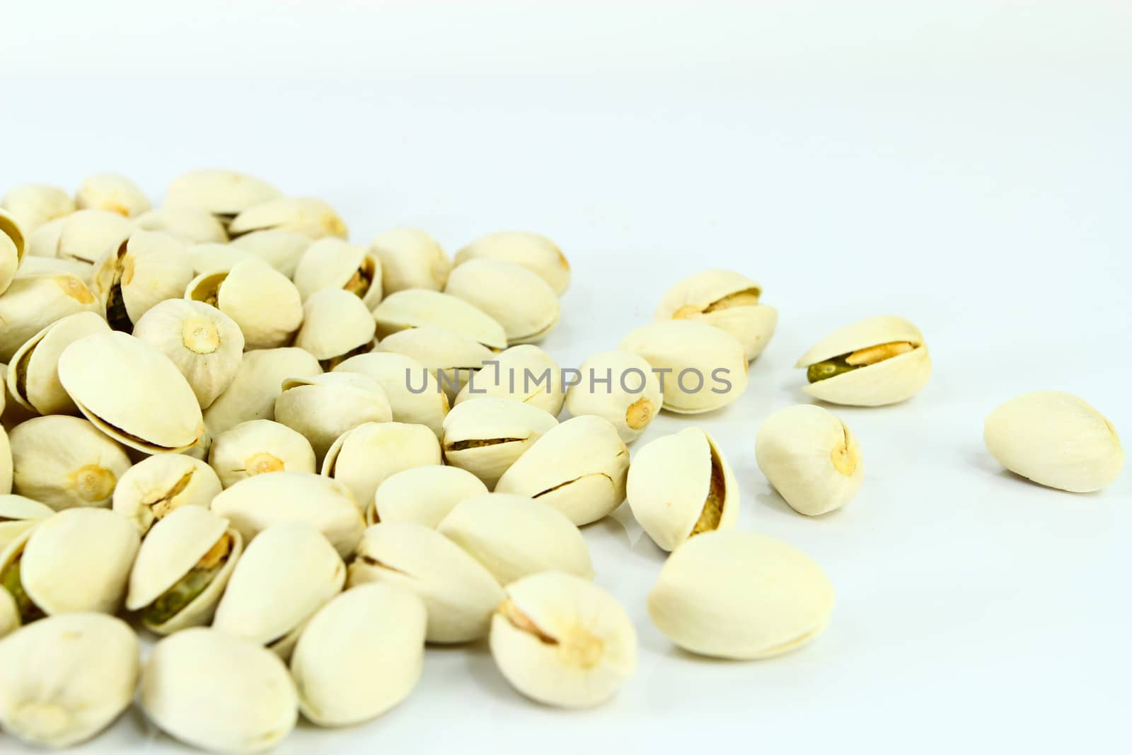 large group of shelled pistachio. by bajita111122