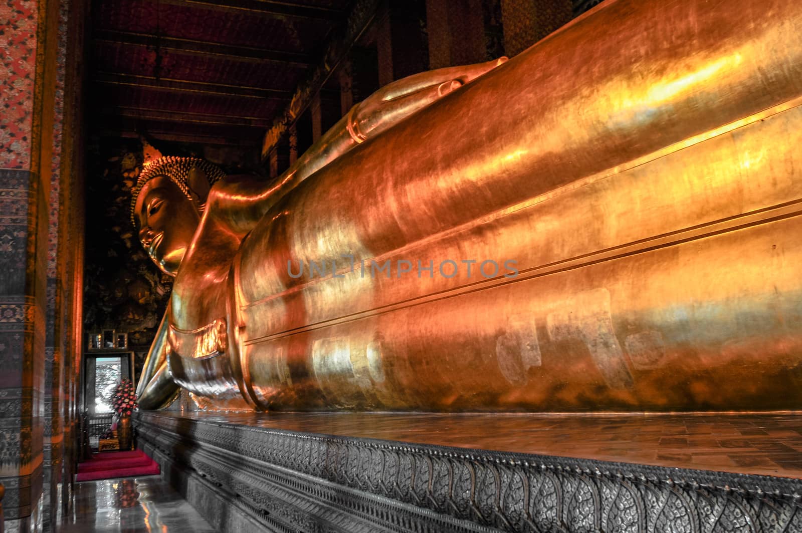 Buddha gold statue face. Wat Pho, Bangkok, Thailand Asia