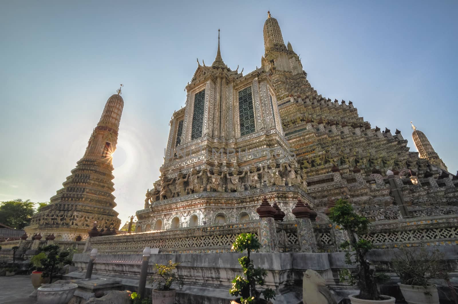 Temple of Dawn Wat Arun and a beautiful blue sky in Bangkok, Thailand Asia