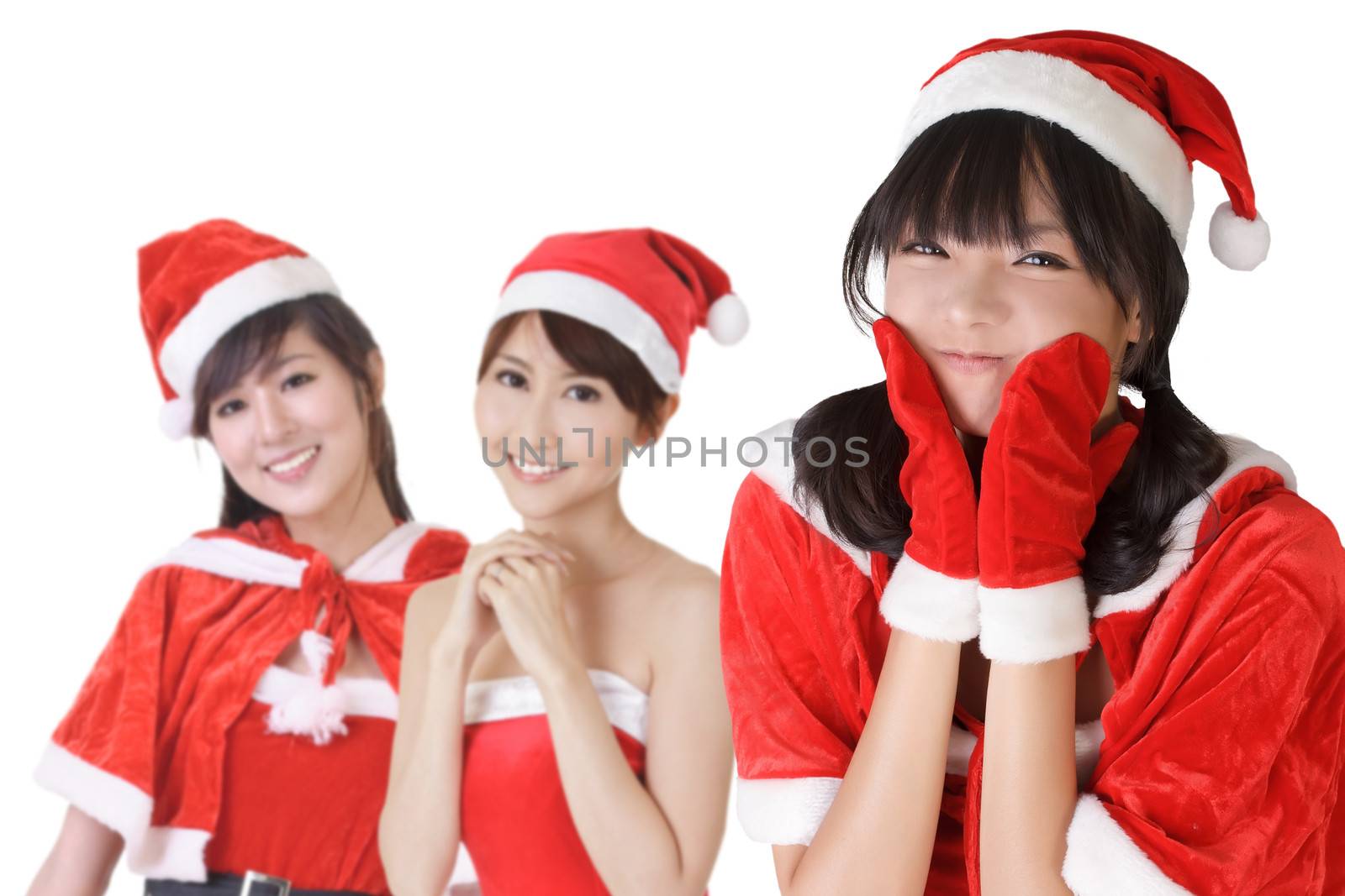 Happy smiling Asian Christmas girls, closeup portrait of three young women.