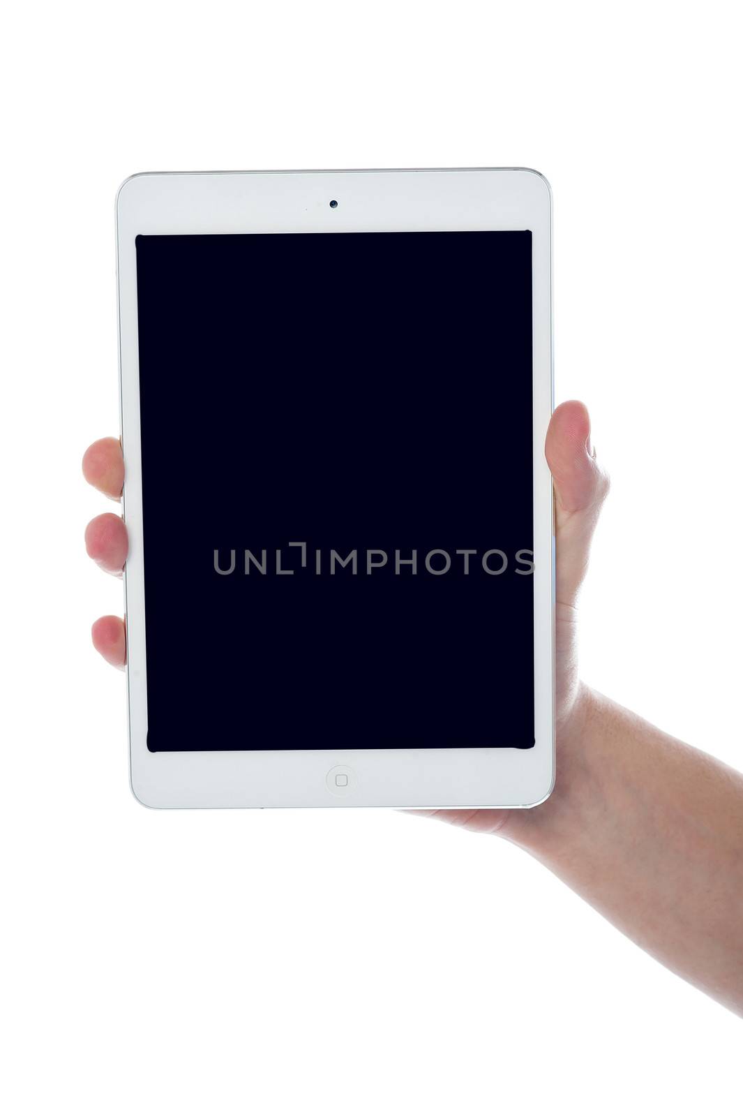 Human hand displaying new tablet pc by stockyimages