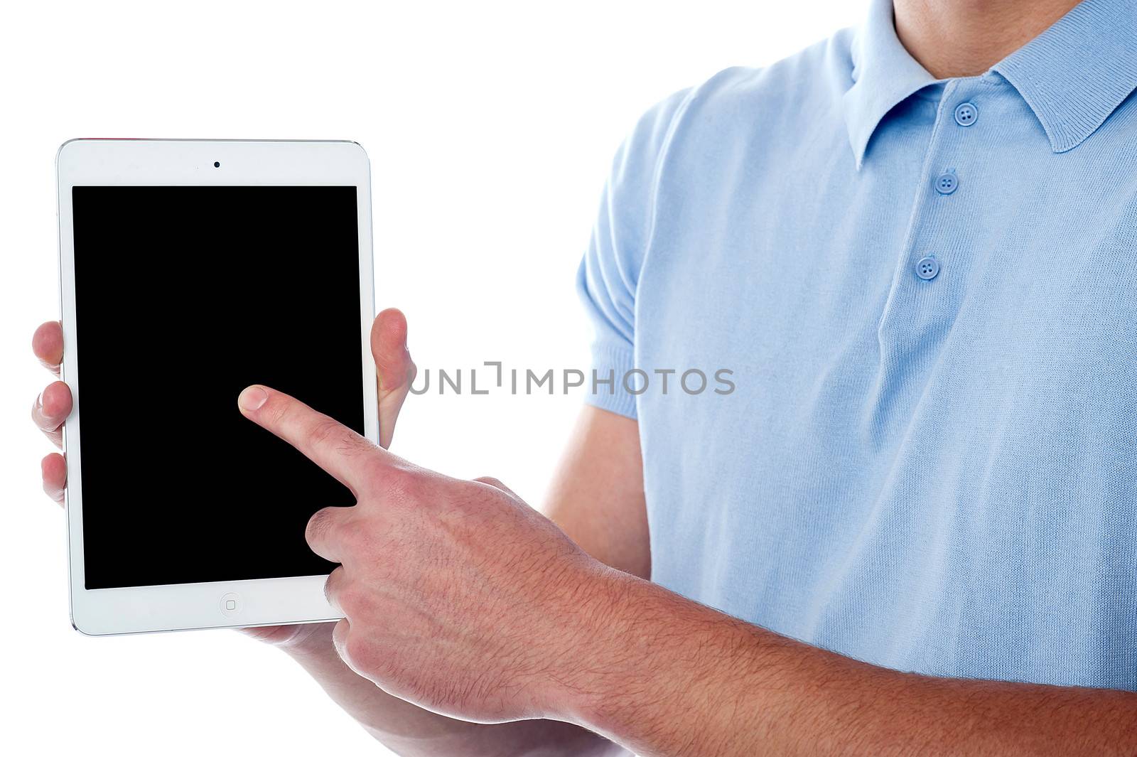 Cropped image of young man showing his new tablet pc device