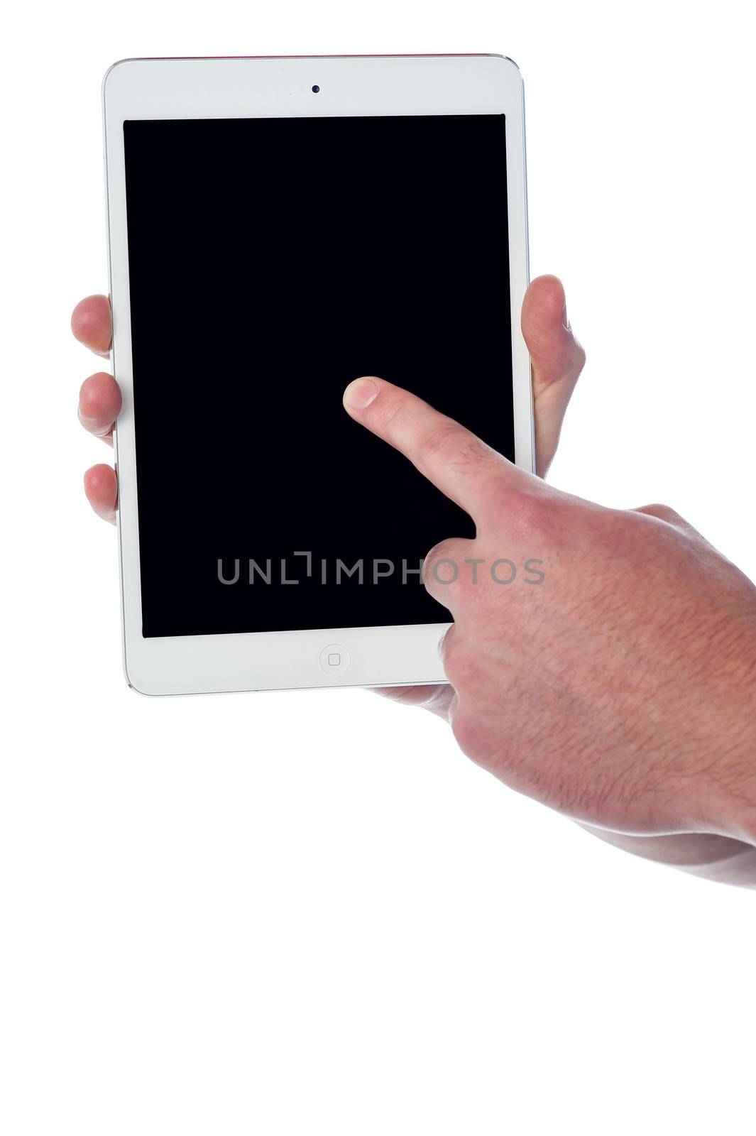 Man hand pointing on touch pad screen by stockyimages