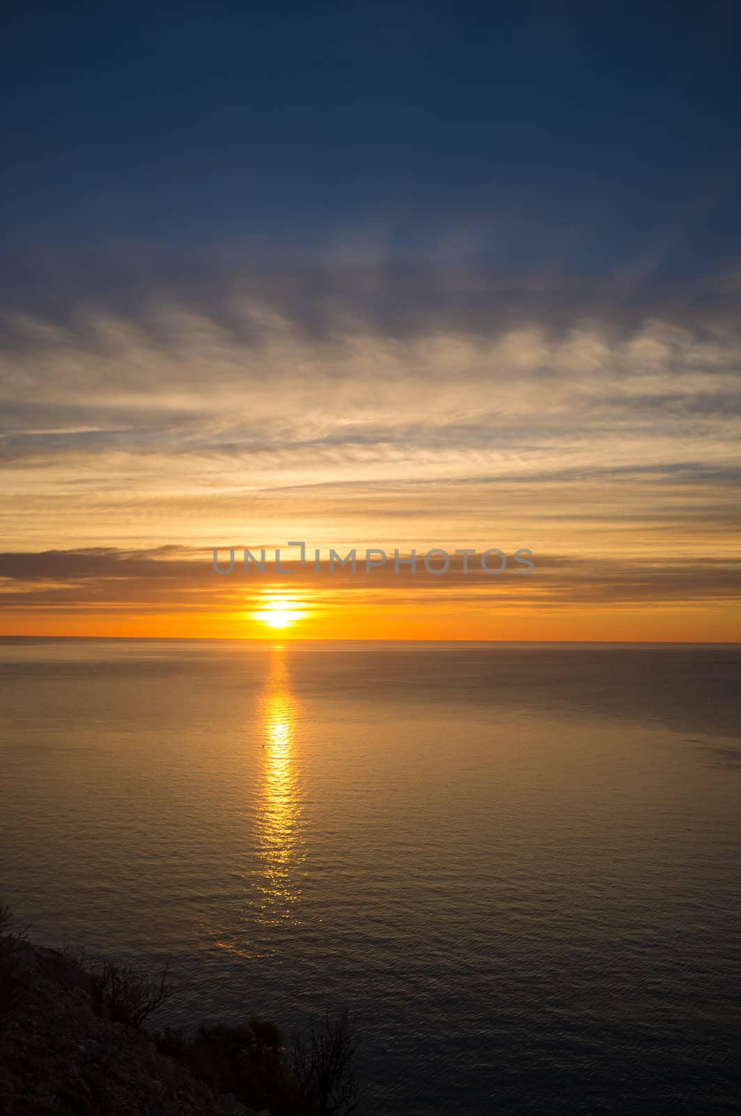 Scenic sunrise  on the Mediterranean on a calm mornig