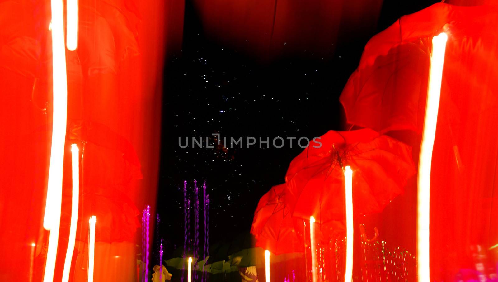 speed of umbrellas neon light by apichart