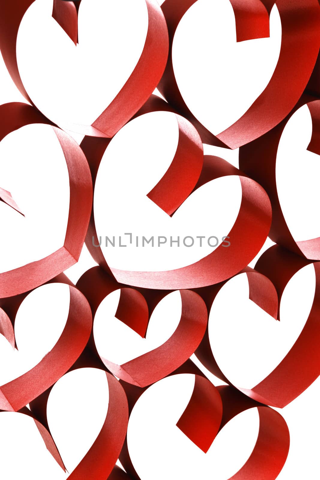 Red ribbon hearts decoration on white background