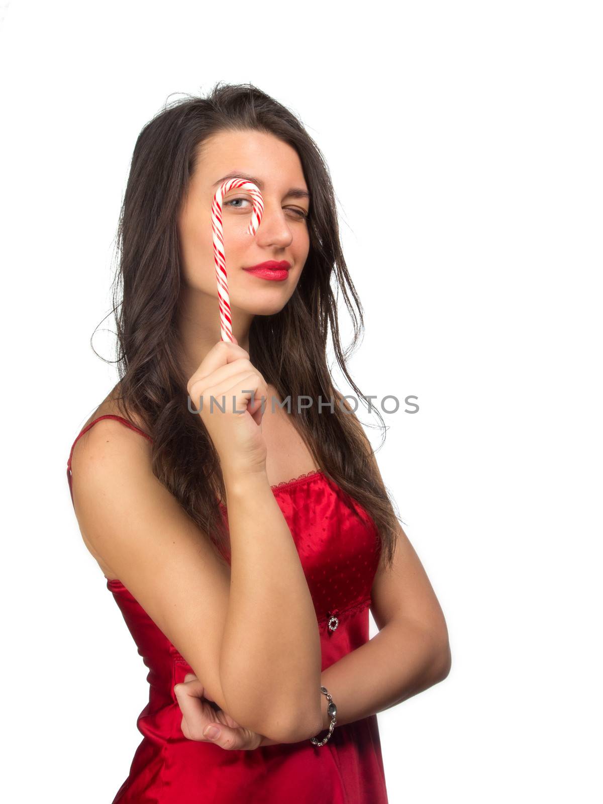 girl lick white-red candy in the form of heart with beautiful make-up   Valentine's day, love.