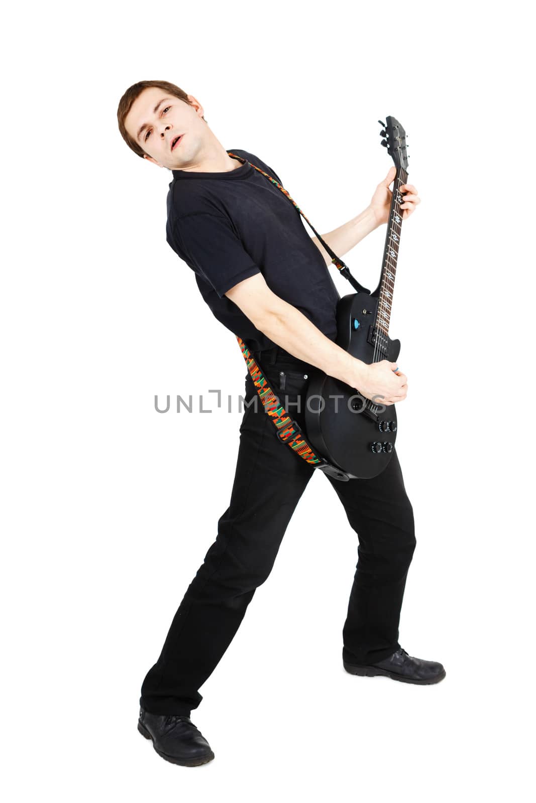 Man in black clothes with an electric guitar