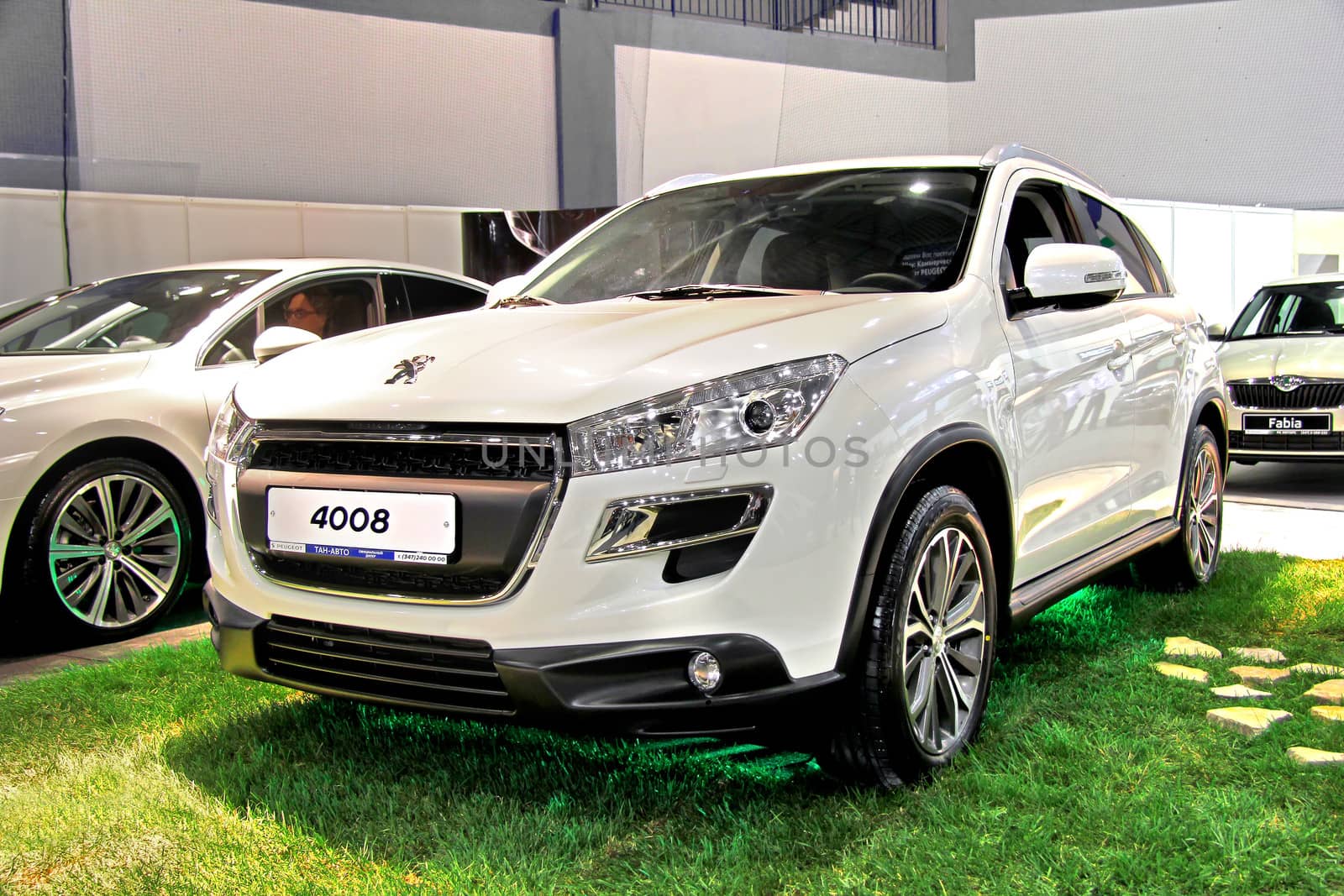 UFA, RUSSIA - MAY 14: French motor car Peugeot 4008 on display at the annual Motor show "Autosalon" on May 14, 2012 in Ufa, Bashkortostan, Russia.