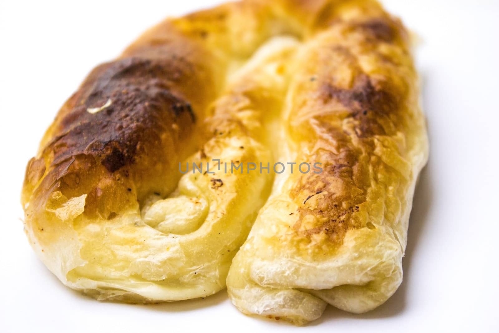 Delicious looking breakfast. Baked pastry with cheese.