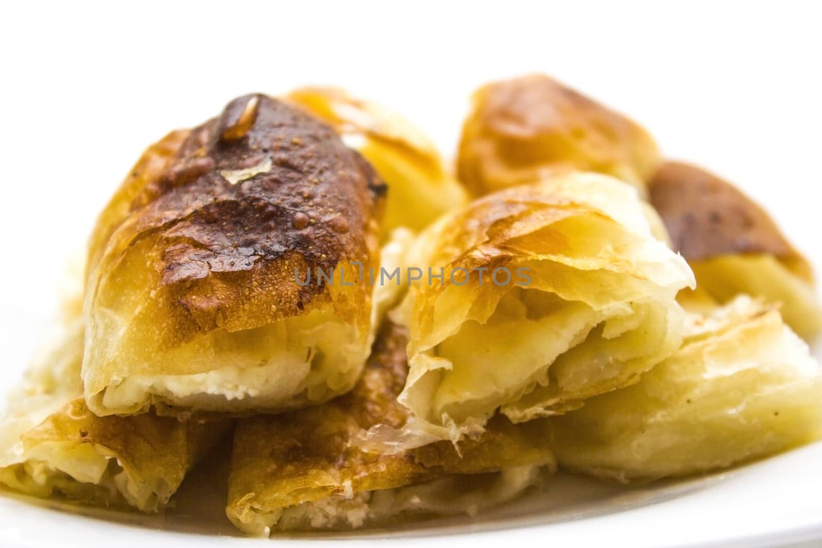 Delicious looking breakfast. Baked pastry with cheese.