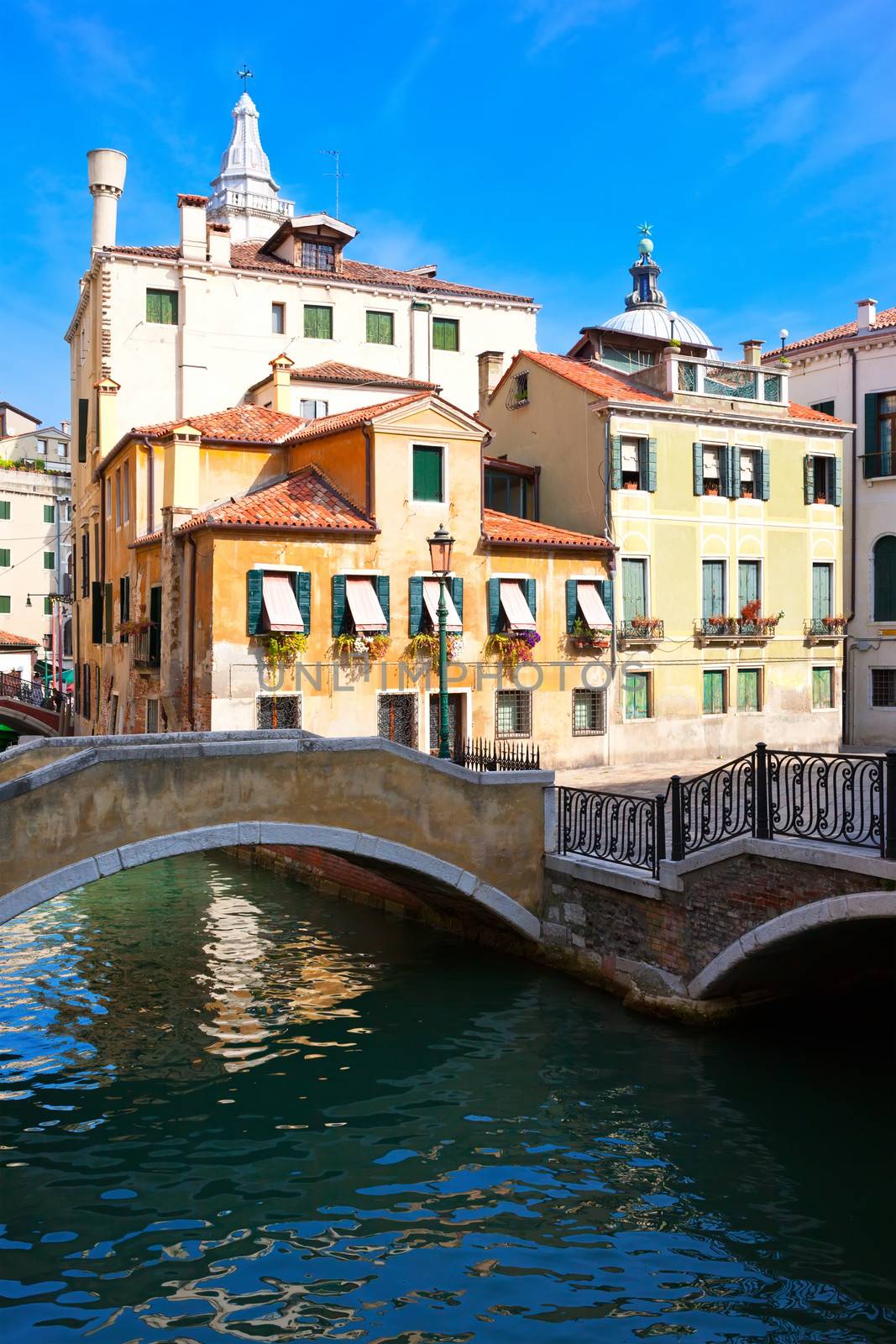 View of beautiful colorful Venetian canal, Venice, Italy