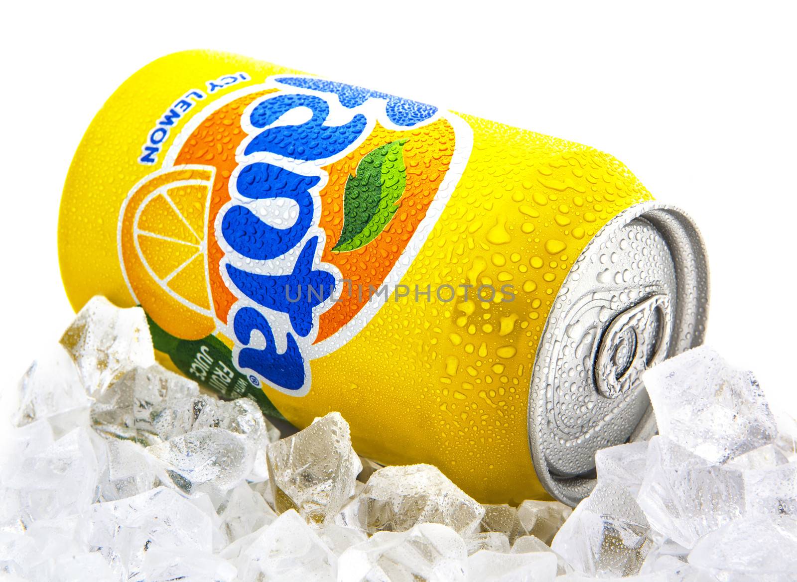 SWINDON, UK - JANUARY 25, 2014:  Fanta Icy Lemon on a bed of ice over white background