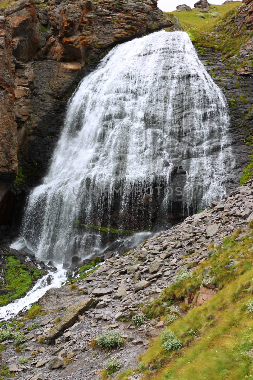 Waterfall Girlish Braids between the mountains of Northern Caucas