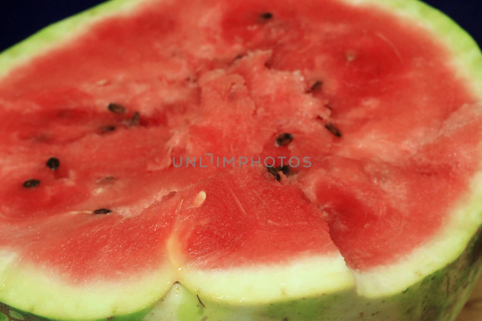 A fresh sugar red watermelon close up