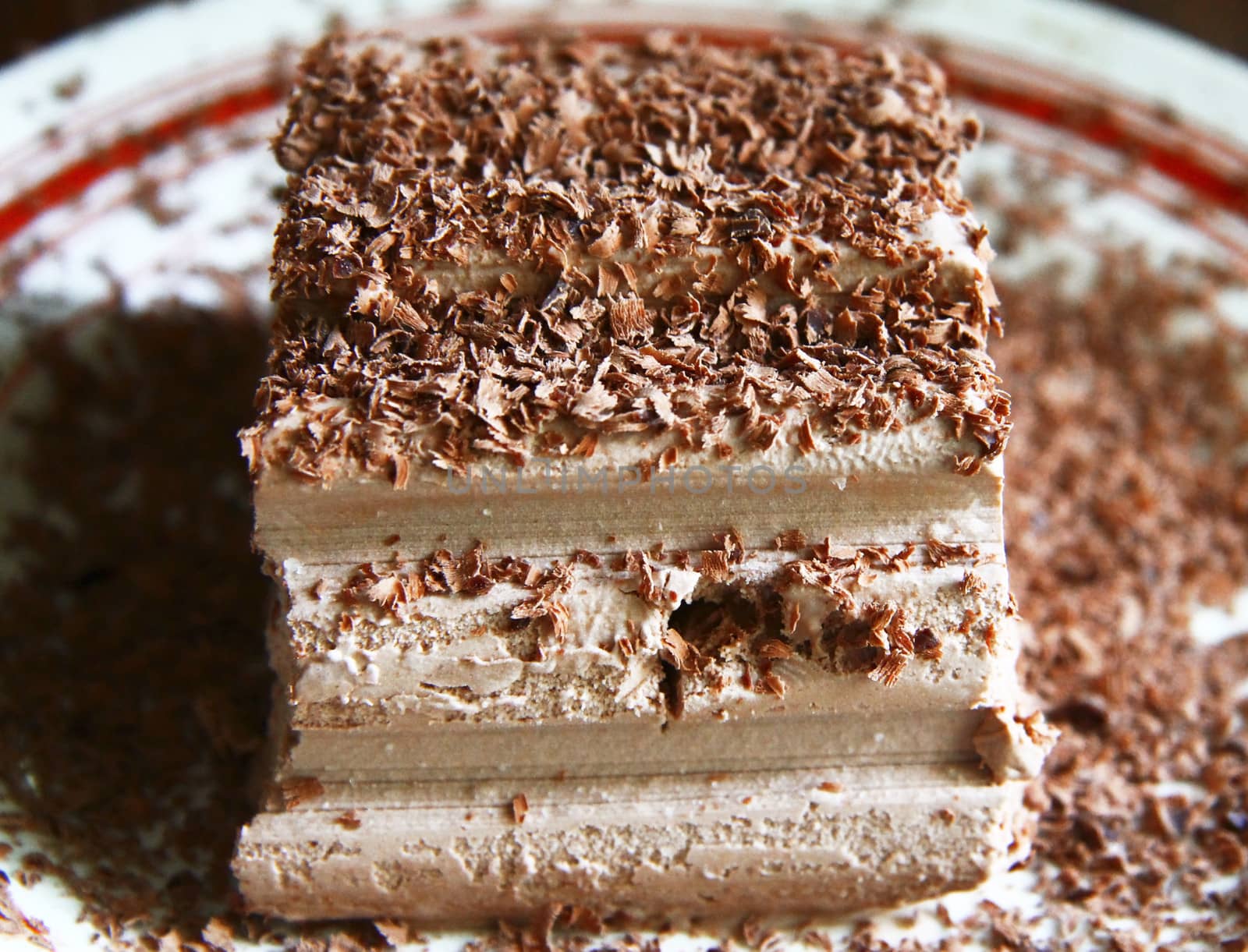 Chocolate ice cream and hardered chocolate over