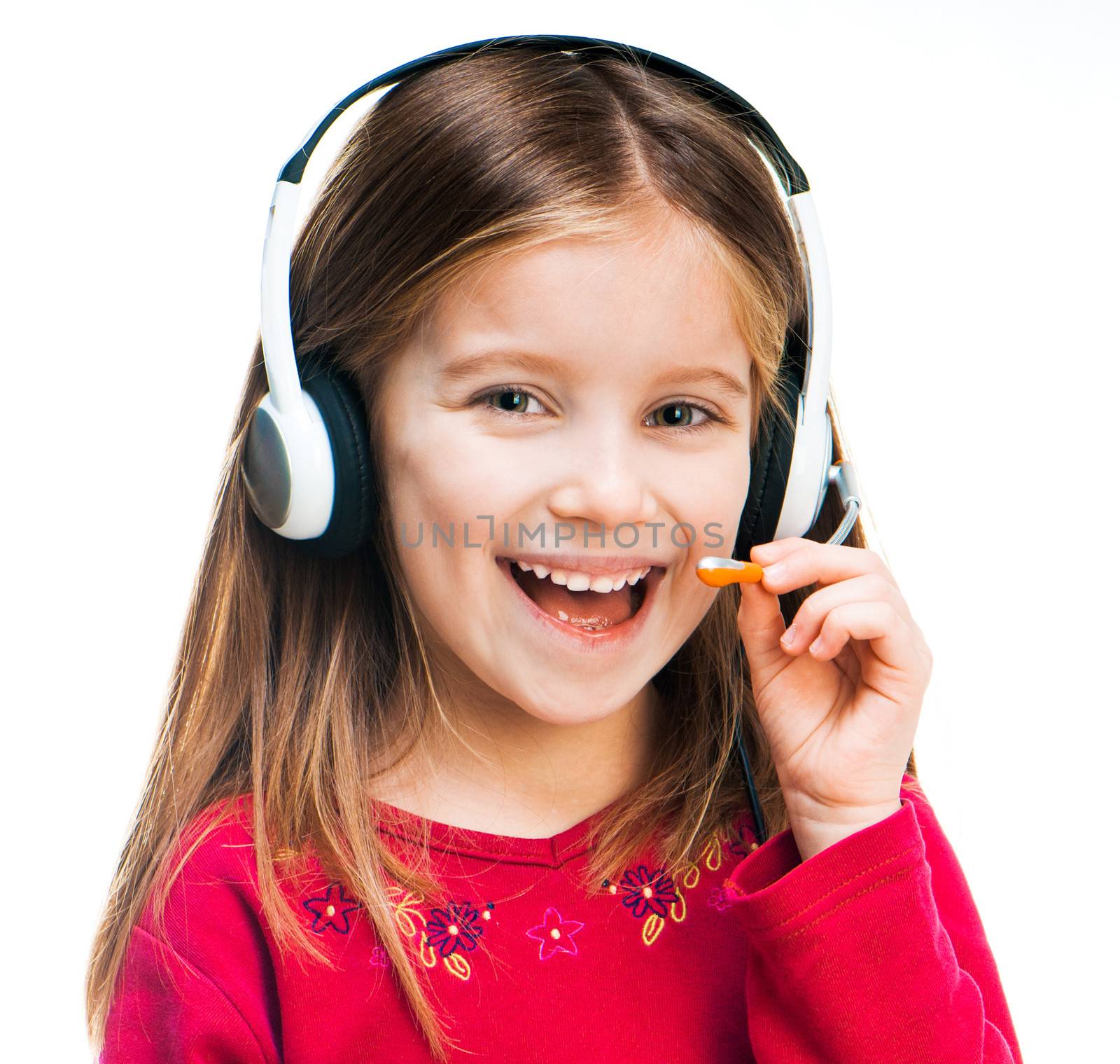 smiling little girl with Headset isolated on white background