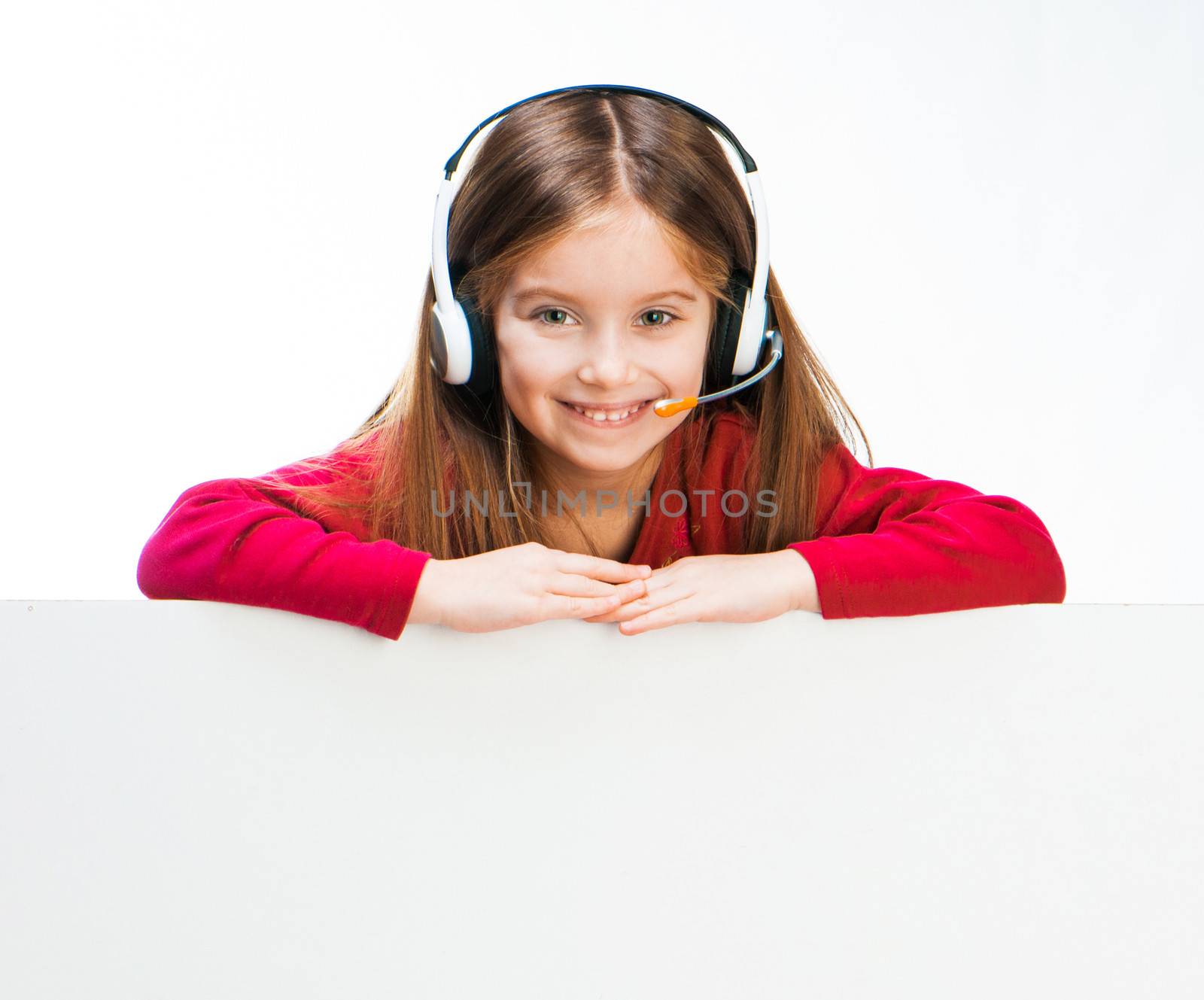 smiling little girl with Headset with white board