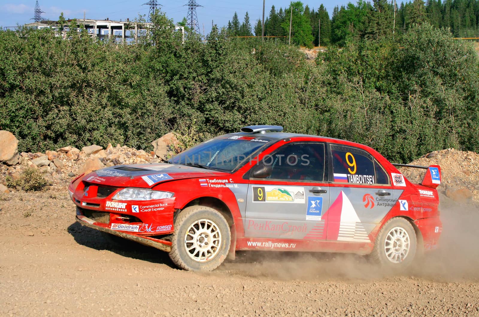 BAKAL, RUSSIA - AUGUST 13: Sergey Tambovtsev's Mitsubishi Lancer Evo VIII (No. 9) competes at the annual Rally Southern Ural on August 13, 2010 in Bakal, Satka district, Chelyabinsk region, Russia.
