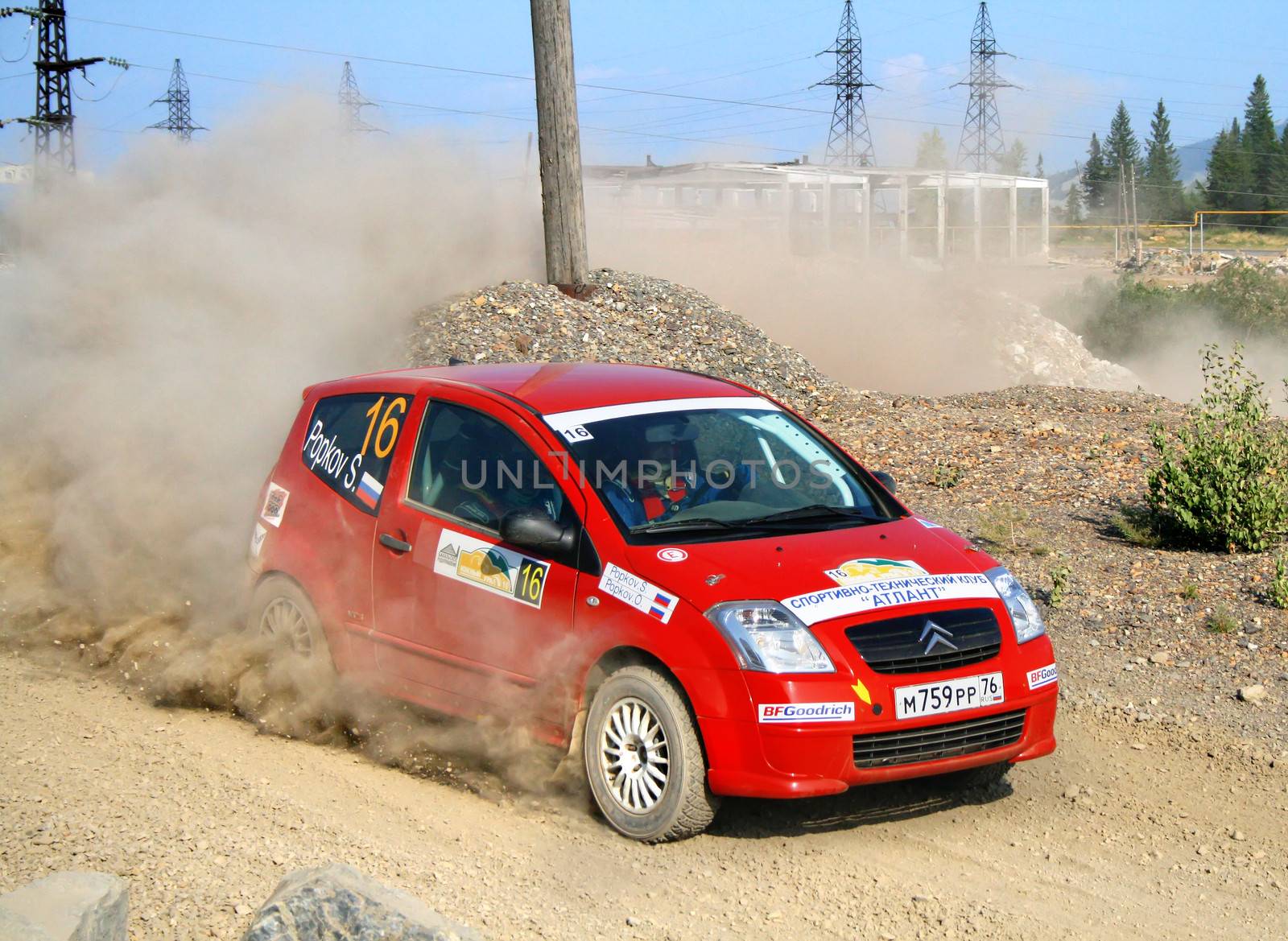 BAKAL, RUSSIA - AUGUST 13: Sergey Popkov's Citroen C2 (No. 16) competes at the annual Rally Southern Ural on August 13, 2010 in Bakal, Satka district, Chelyabinsk region, Russia.