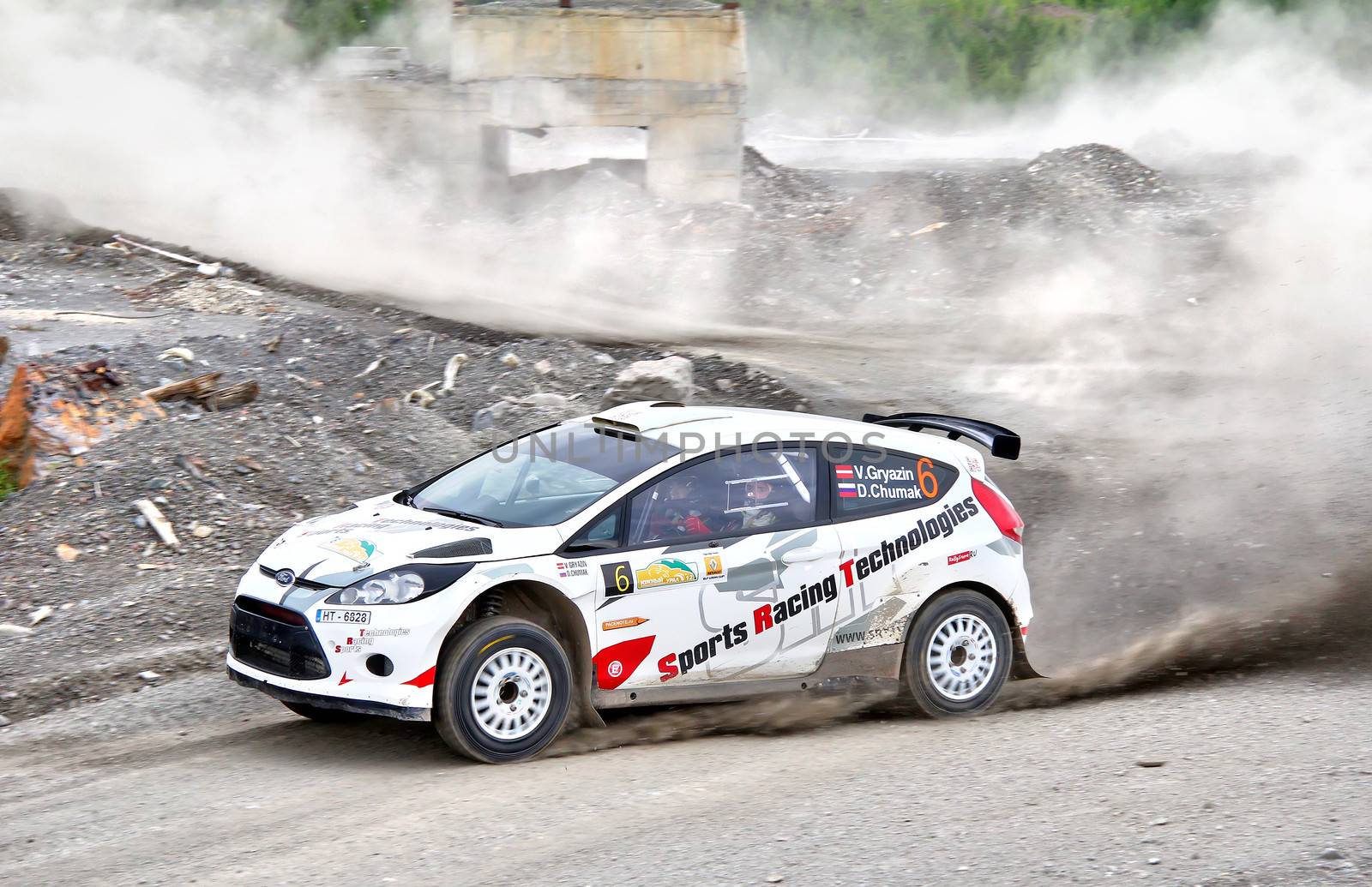 BAKAL, RUSSIA - JULY 21: Vasiliy Gryazin's Ford Fiesta (No. 6) competes at the annual Rally Southern Ural on July 21, 2012 in Bakal, Satka district, Chelyabinsk region, Russia.