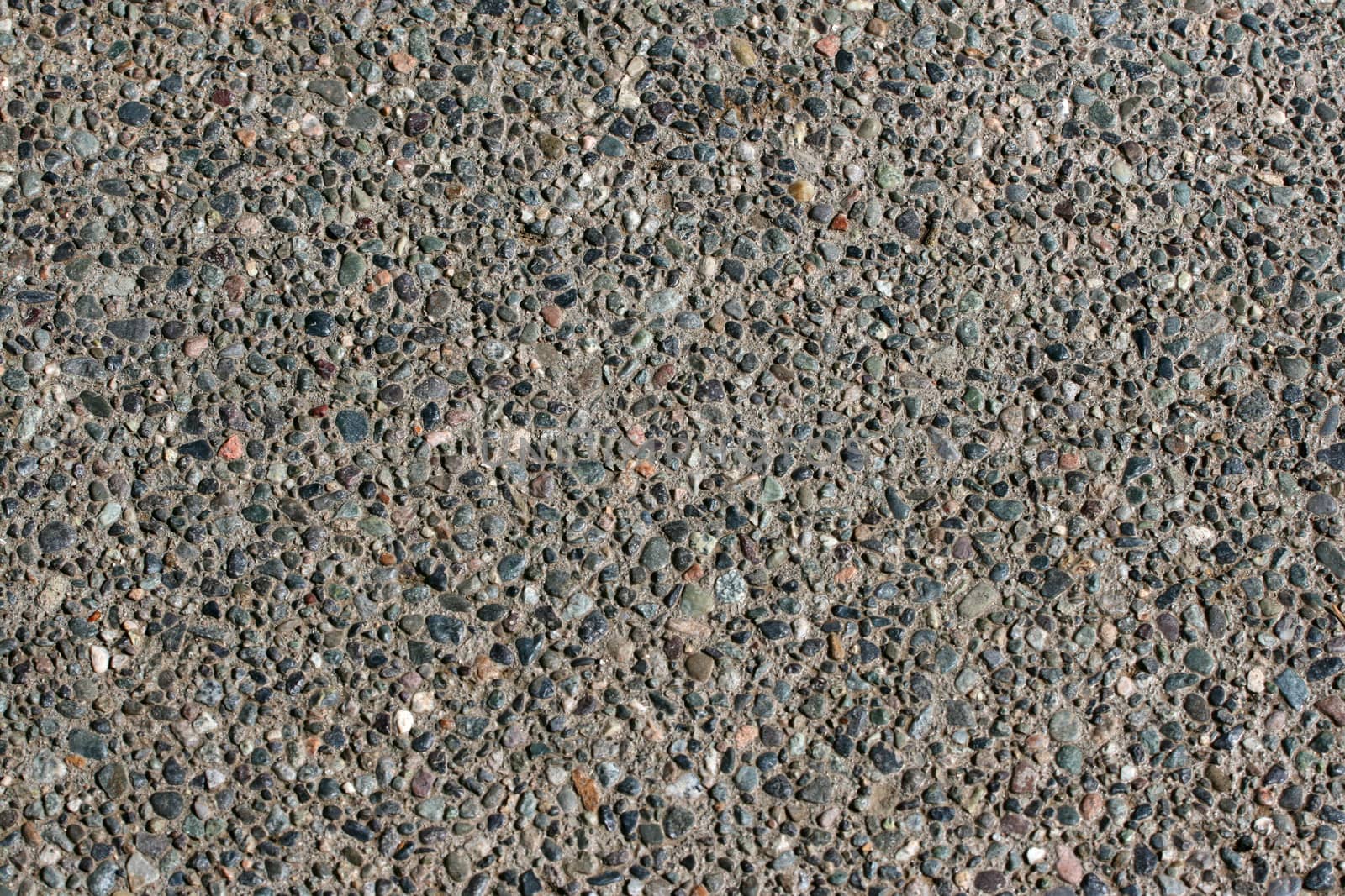 Gravel road texture with various colored stones