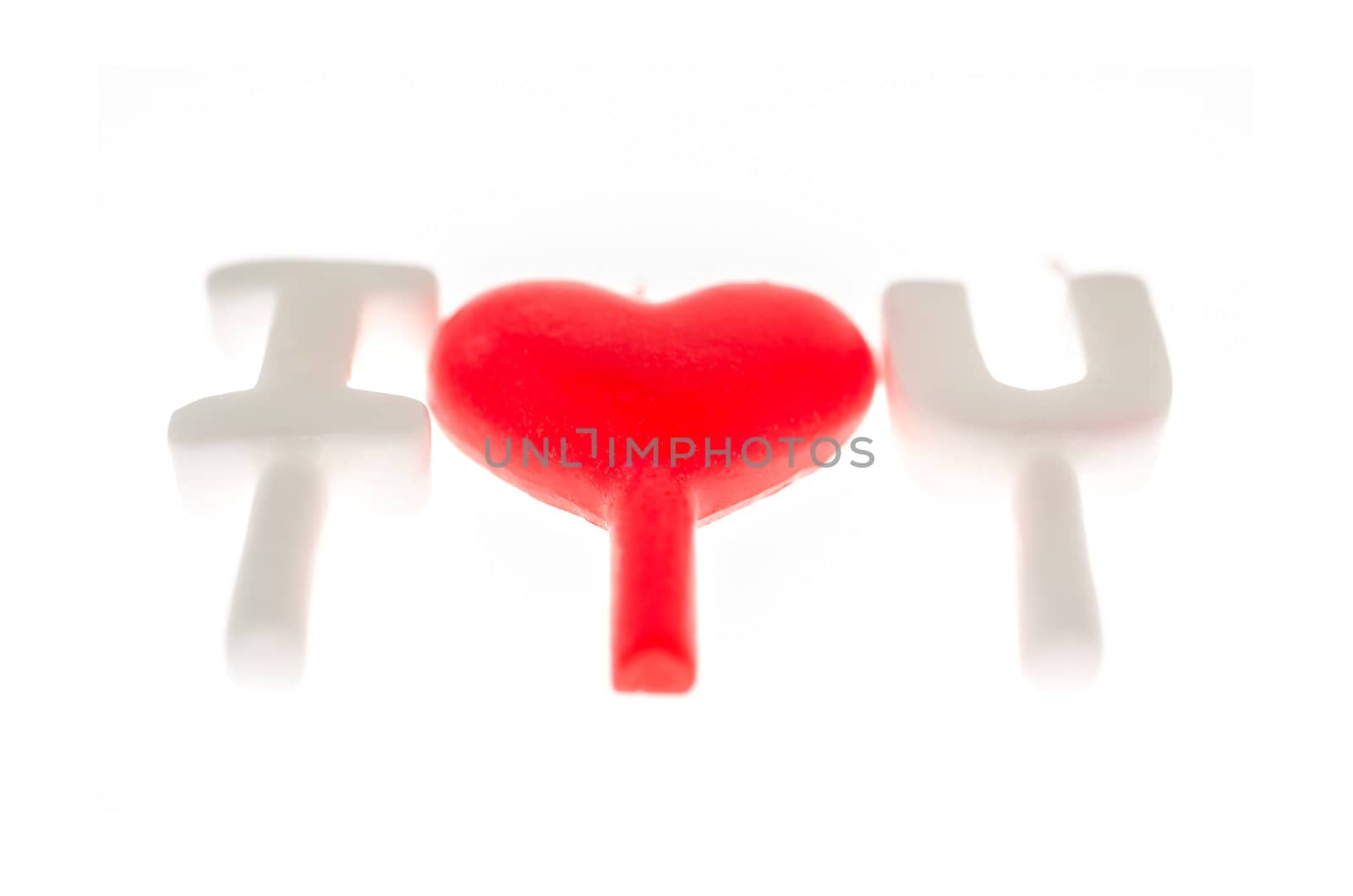 candles making 'I love you' isolated on white  (clipping path included) 