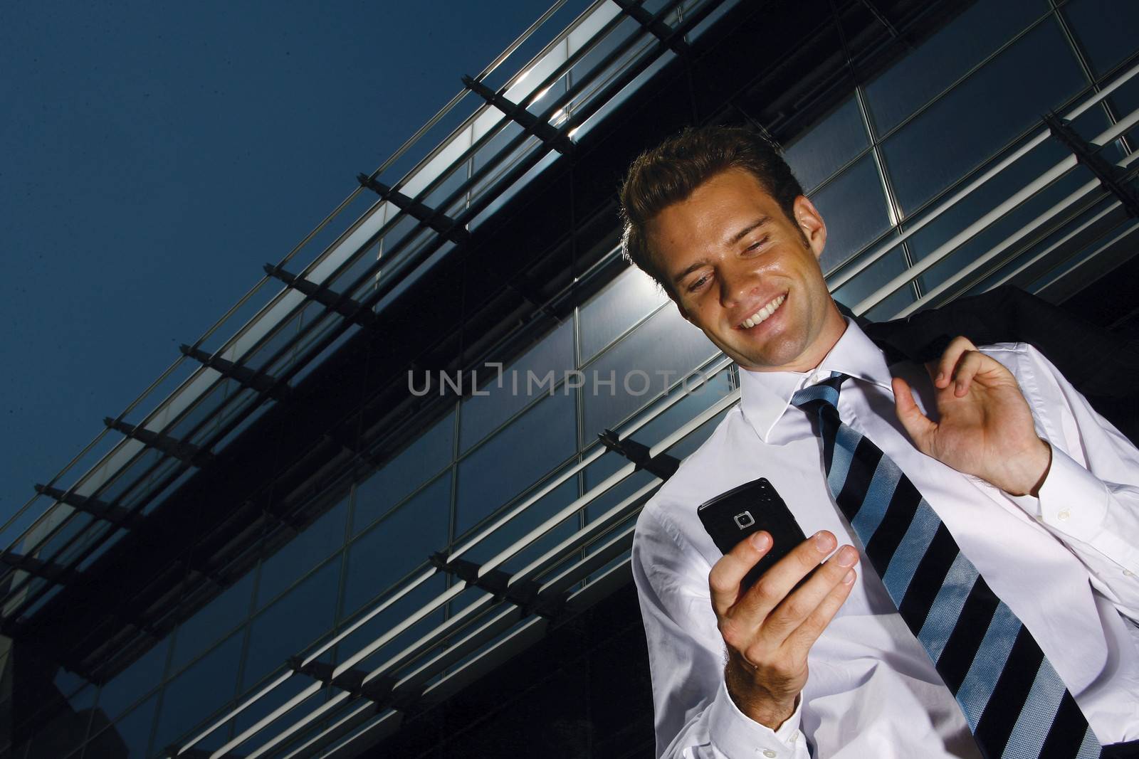 businessman on a background of a modern building 