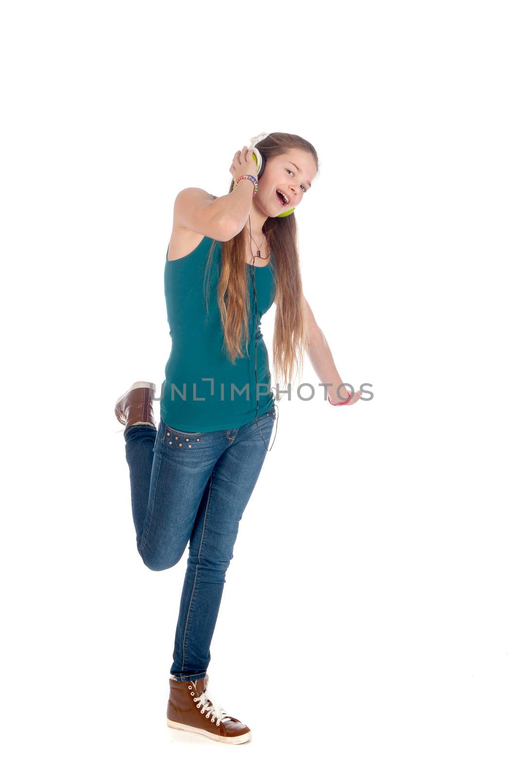 a happy teenager, listen to some music, on a white background