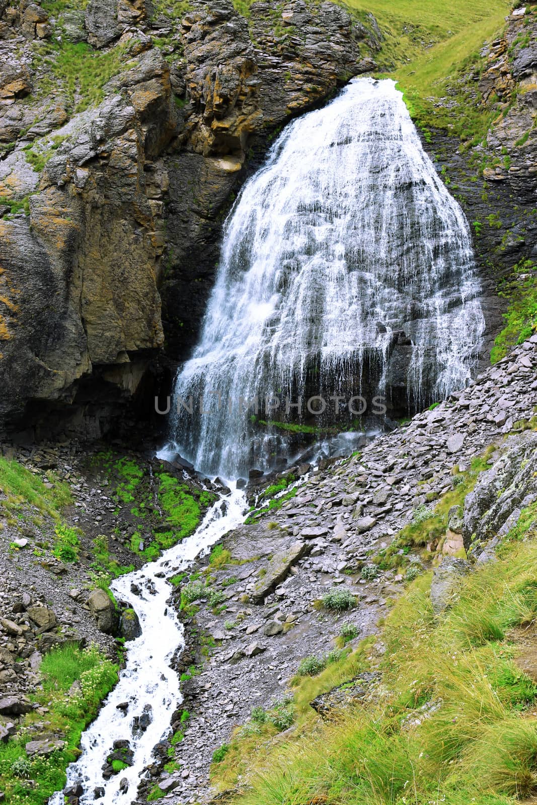 Waterfall Girlish Braids between the mountains of Northern Caucas