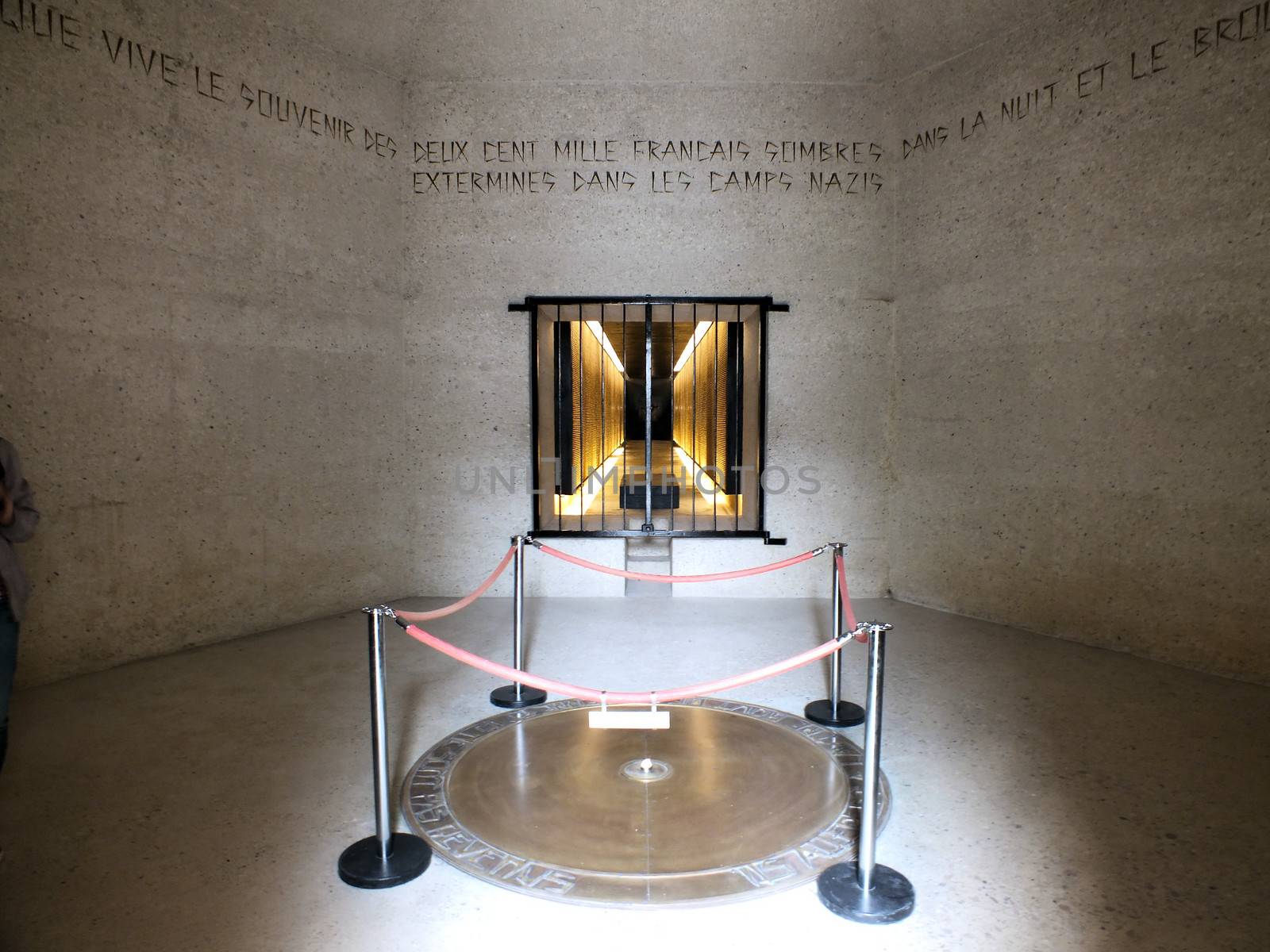 The Memorial des Martyrs de la Deportation was opened in 1962 as a memorial to the 200,000 people deported from Vichy France to the Nazi concentration camps during World War II. 
The circular plaque on the floor is inscribed "They descended into the mouth of the earth and they did not return".