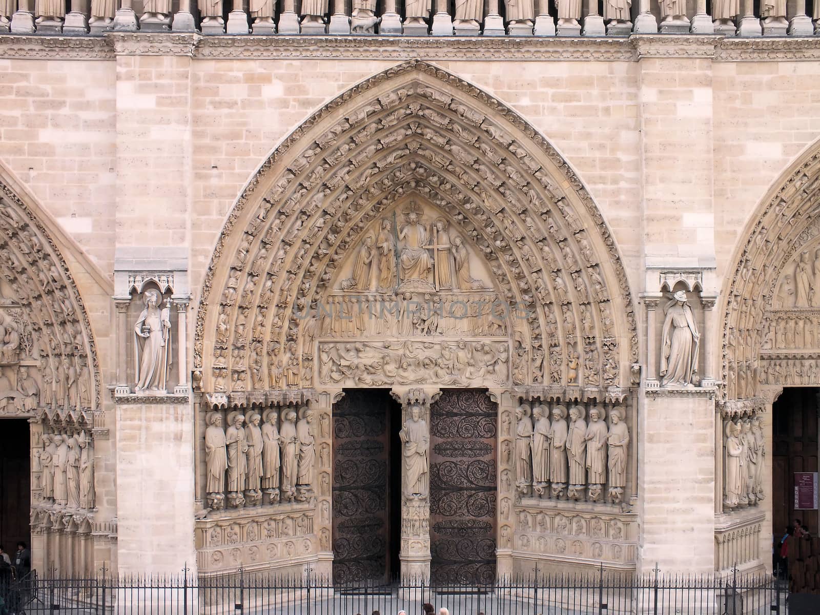The western facade of Notre-Dame Cathedral including the main entrance was completed in 1225