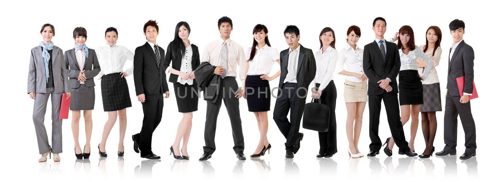 Asian business team, businesswomen and businessmen in group standing and looking at you, isolated on white background.