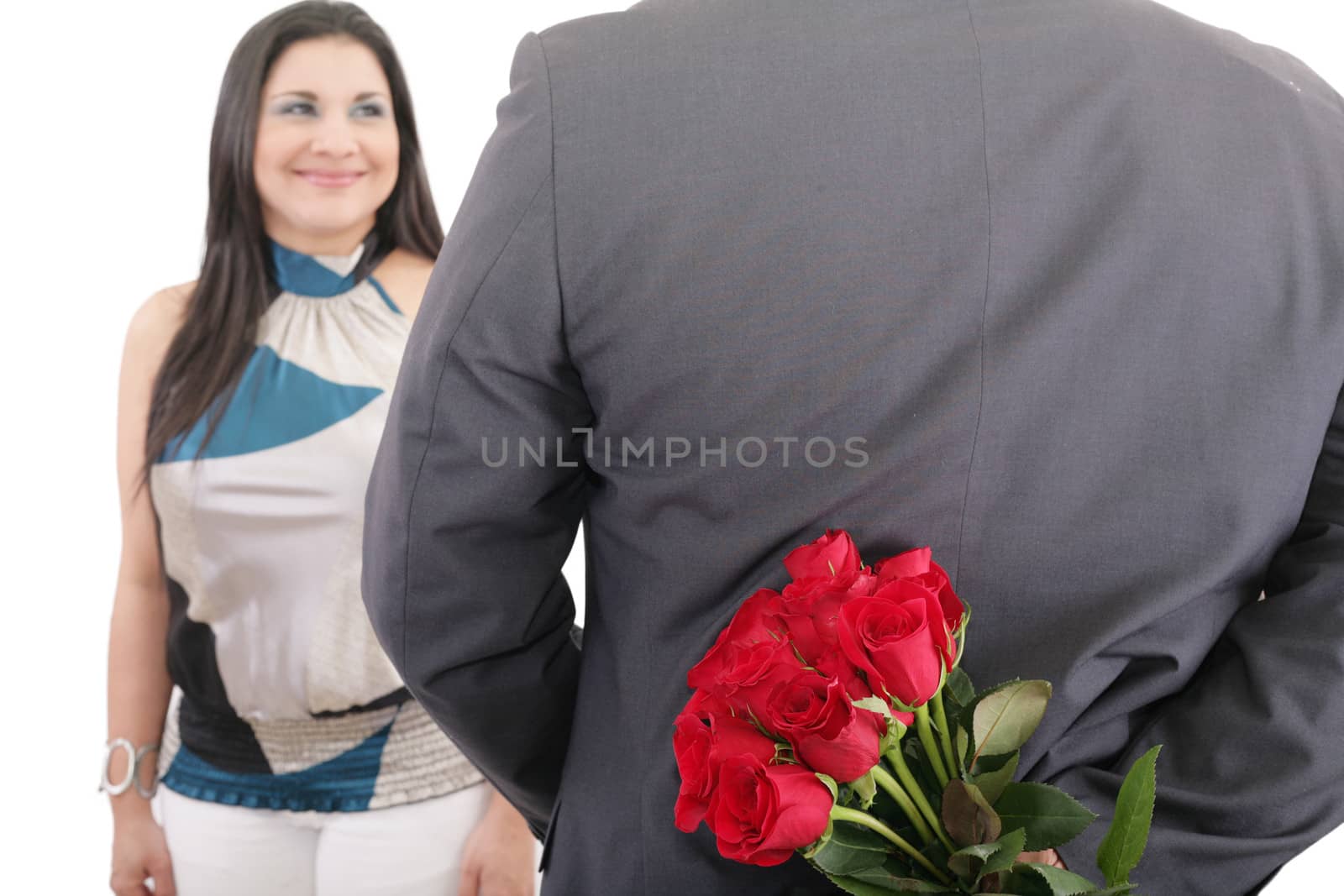 man with a bouquet of red roses watching his woman isolated, valentines day concept