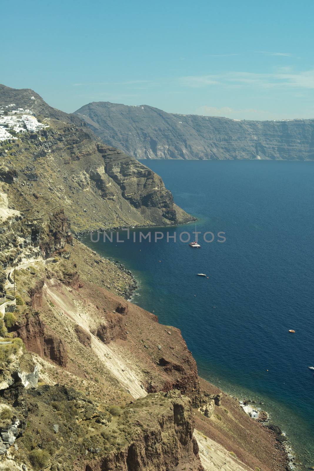 View on rock coastline on Santorini island, Greece.