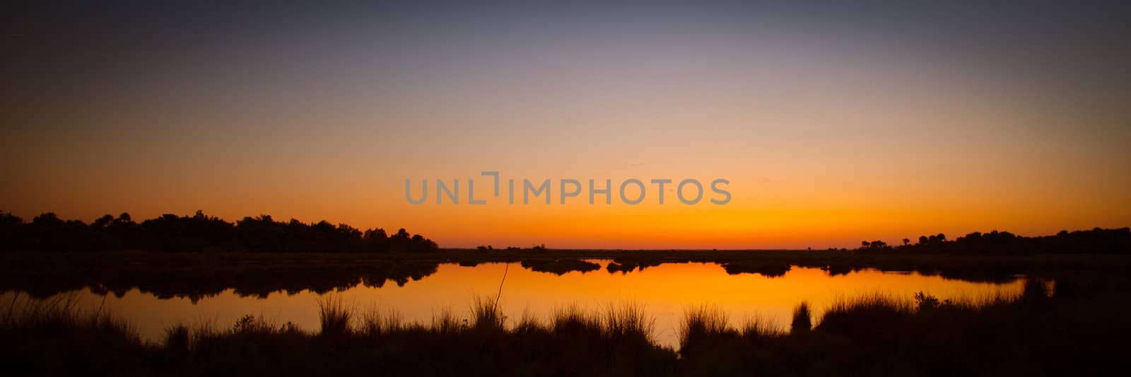 Lake at sunset, Black Point Wildlife Drive, Merritt Island National Wildlife Refuge, Titusville, Florida, USA