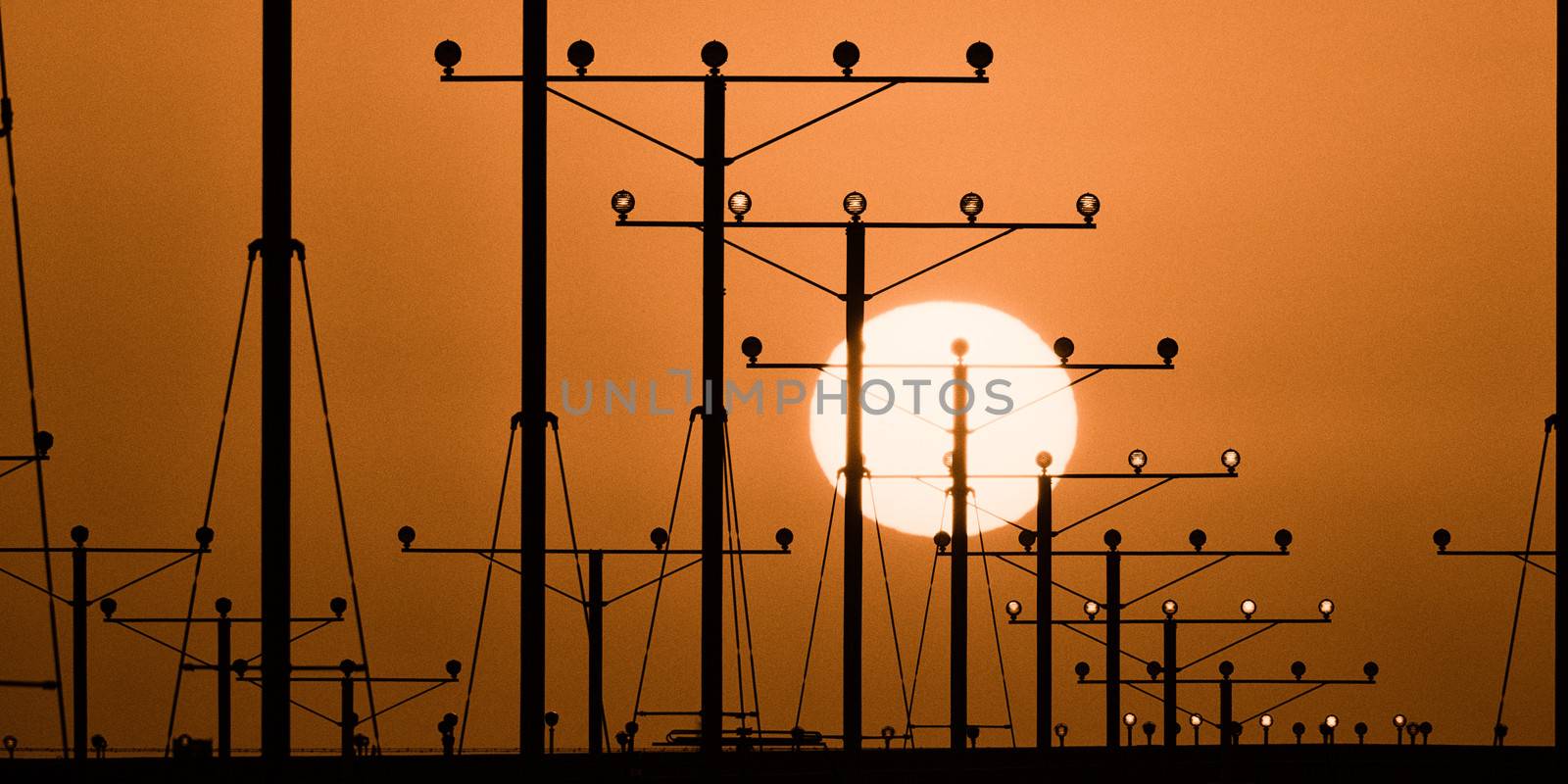 Landing lights during sunset at Los Angeles International Airport, Los Angeles, California, USA