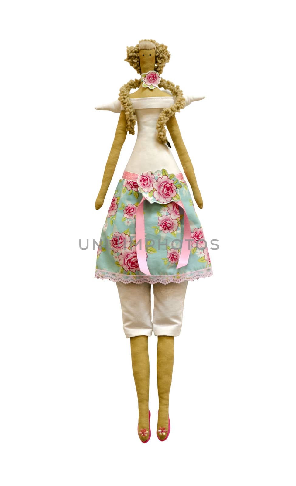 The Handmade isolated doll in dress and pants with wings and roses